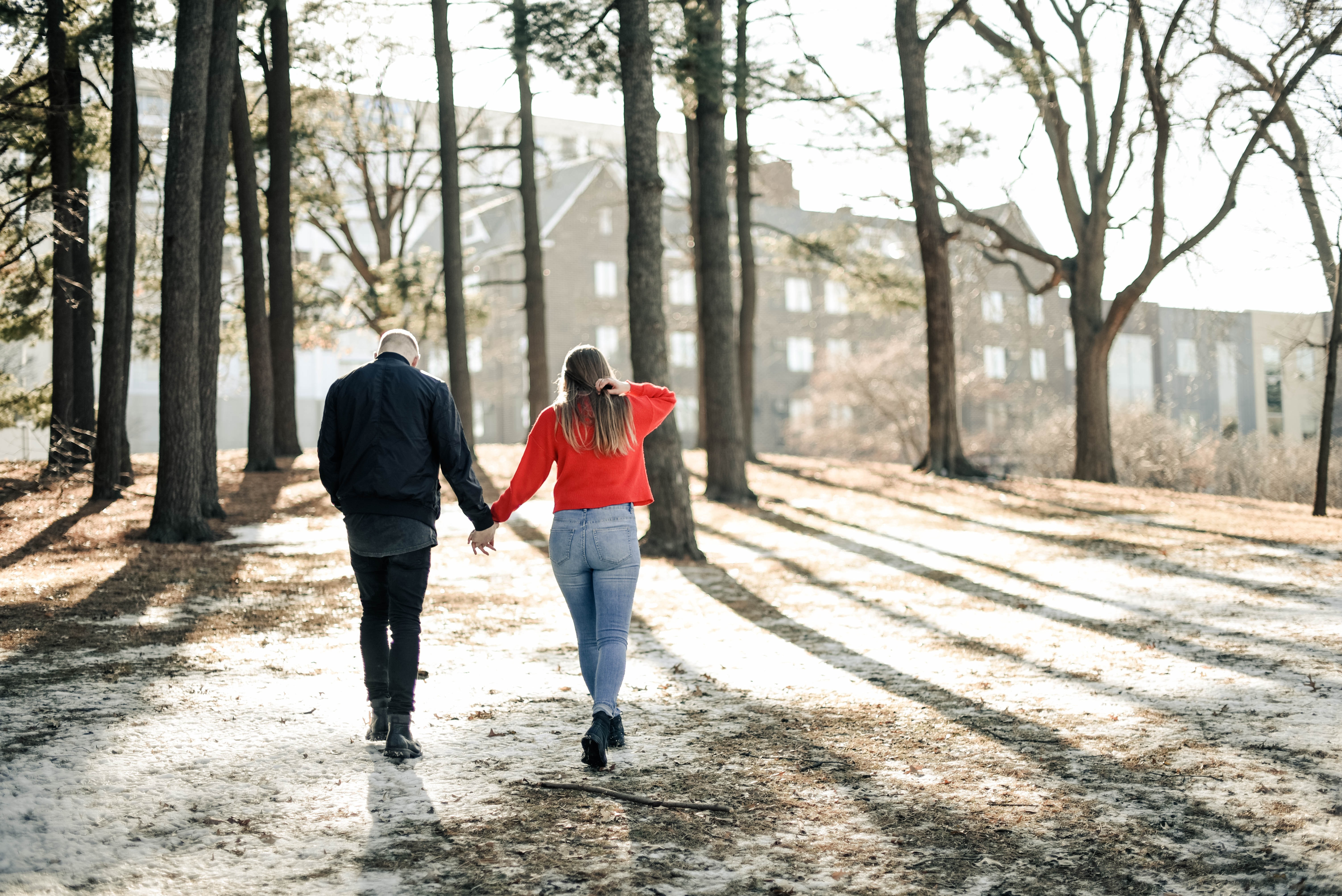 College couple holding hands