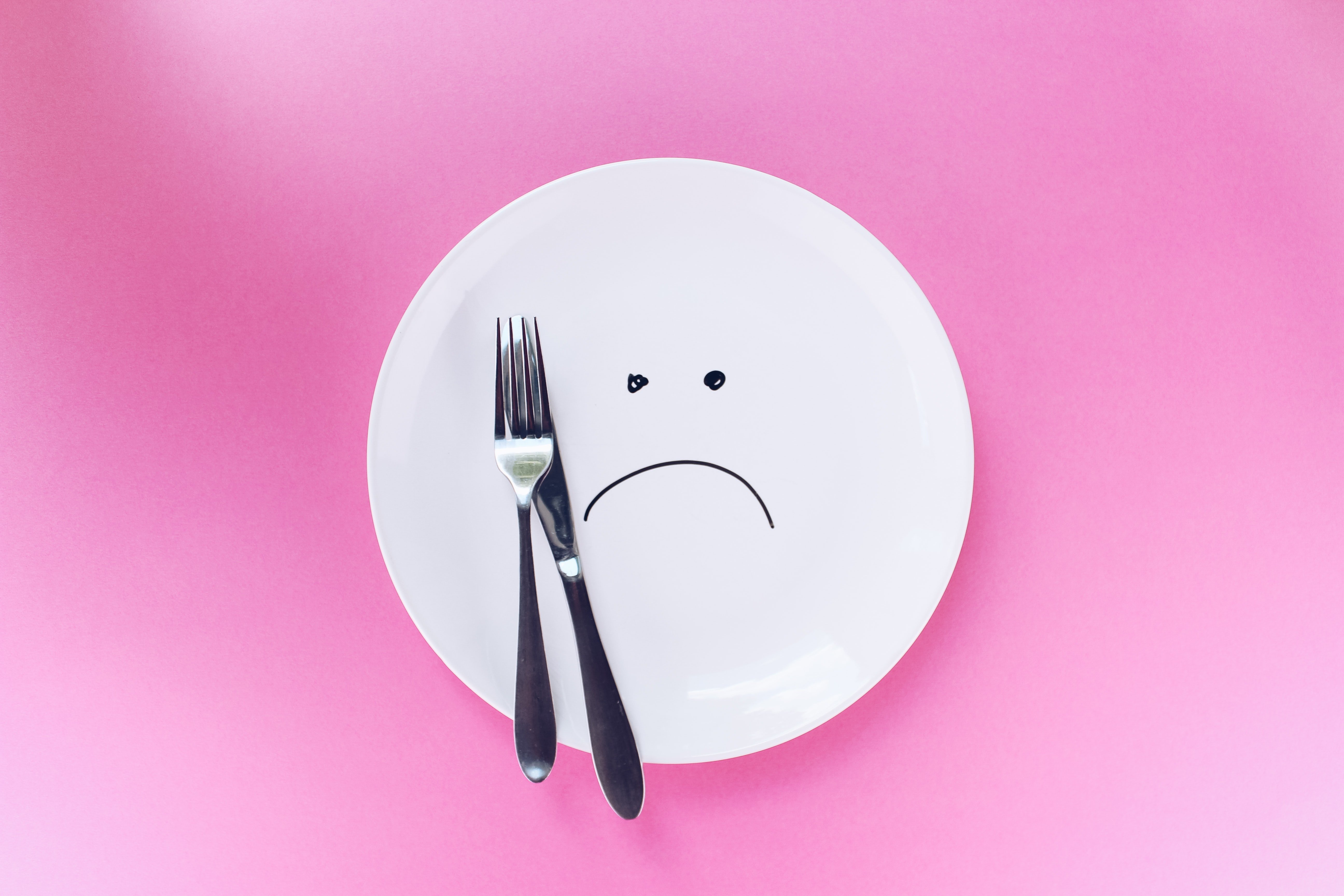 sad empty dinner plate by Thought Catalog via Unsplash?width=698&height=466&fit=crop&auto=webp&dpr=4