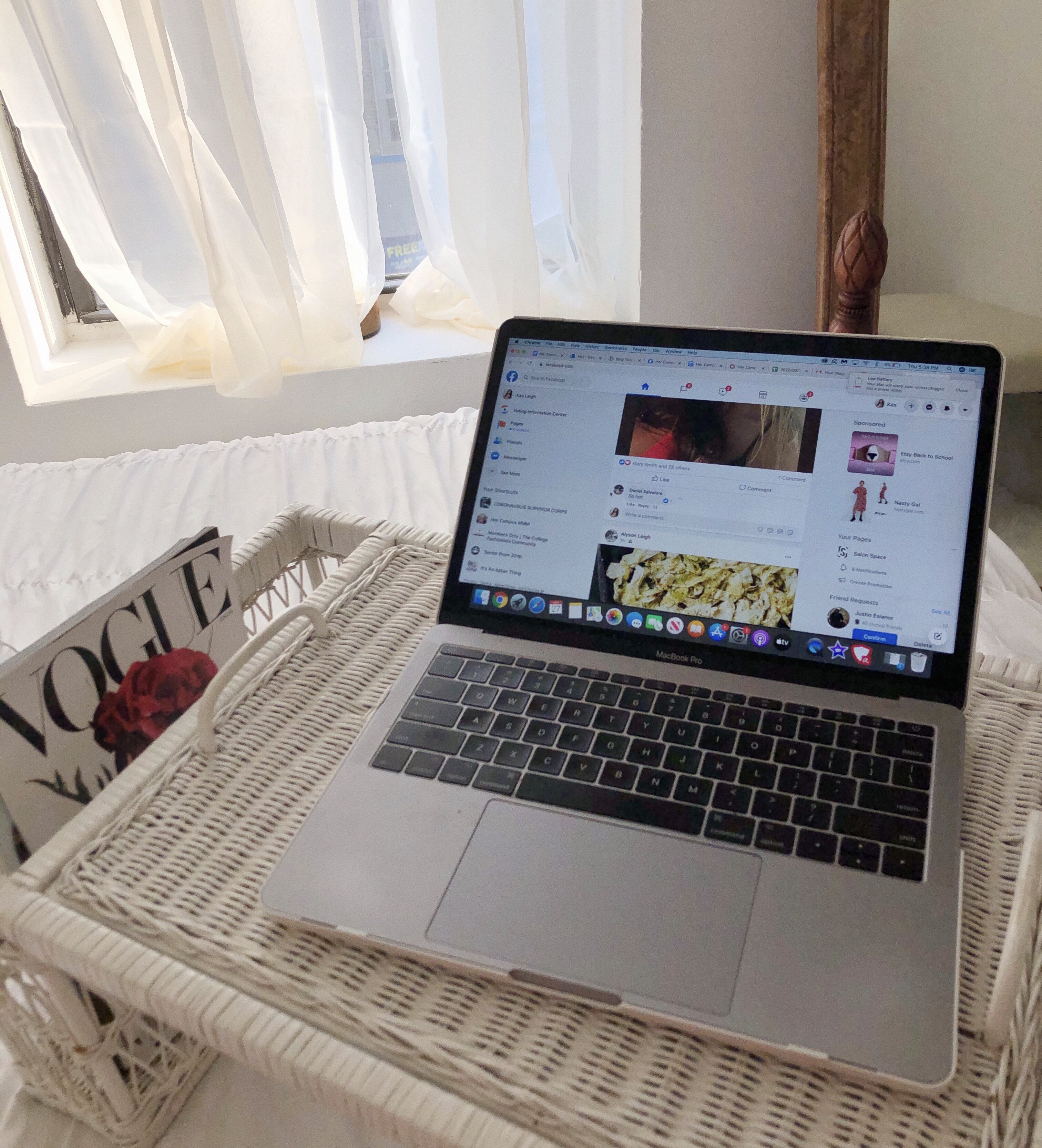 A laptop open to Facebook by Kasey Dugan?width=698&height=466&fit=crop&auto=webp&dpr=4