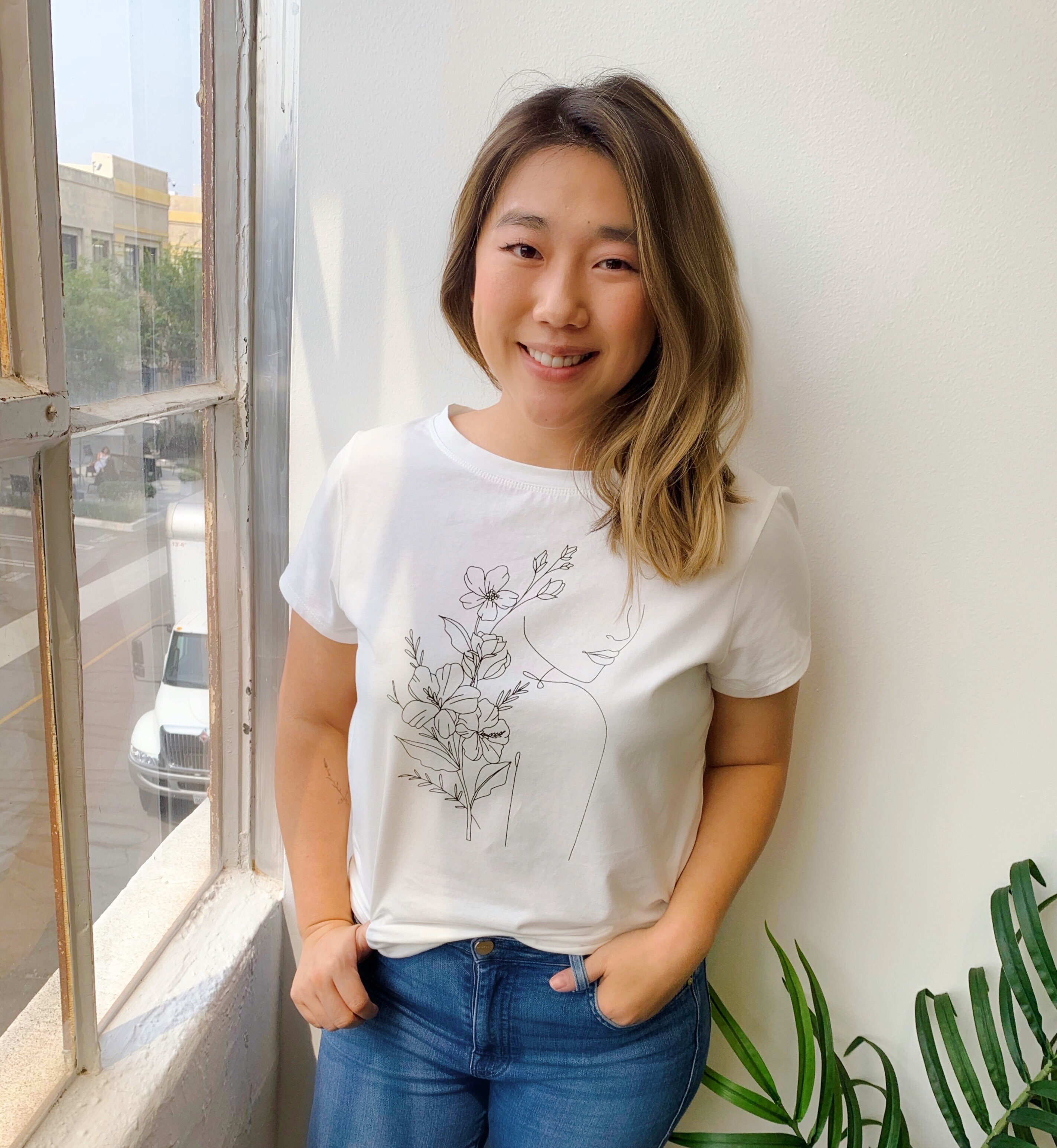 Carol Min wearing floral tee by MAUBY