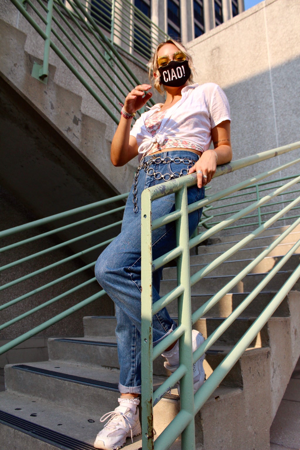 Woman on campus posing for fashion shoot