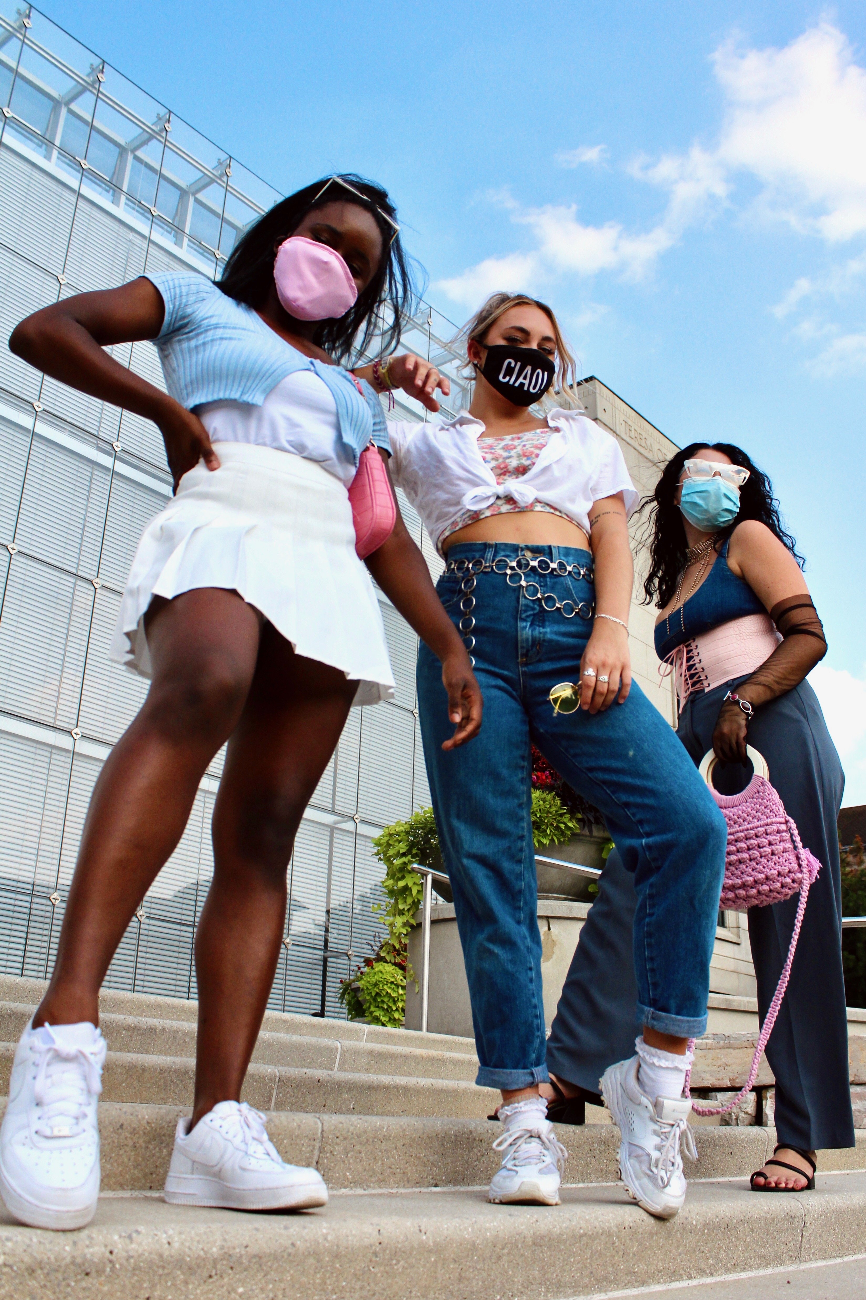 Models pose on staircase