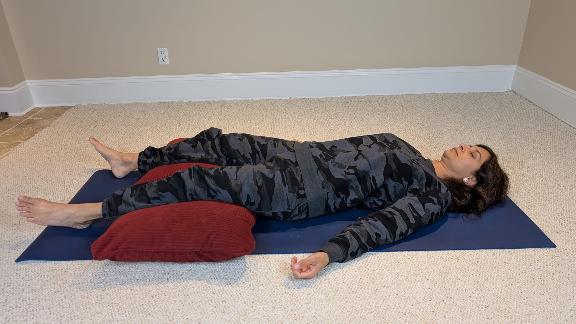 Woman in corpse pose