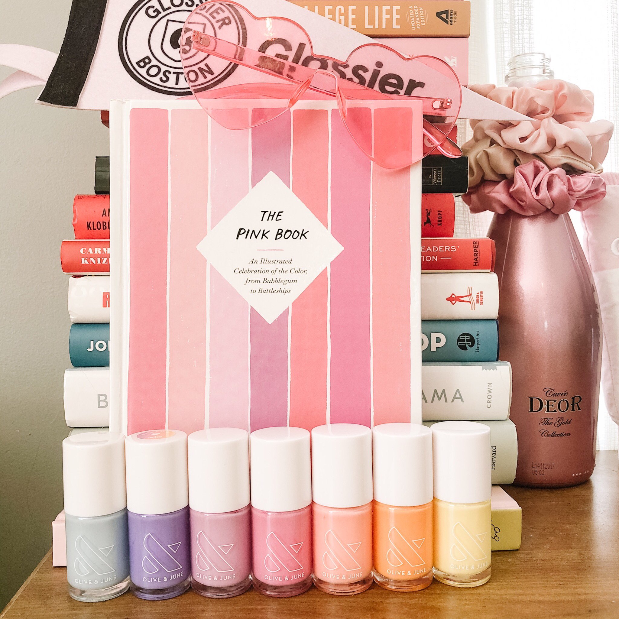 interior design of desk with books and nail polish