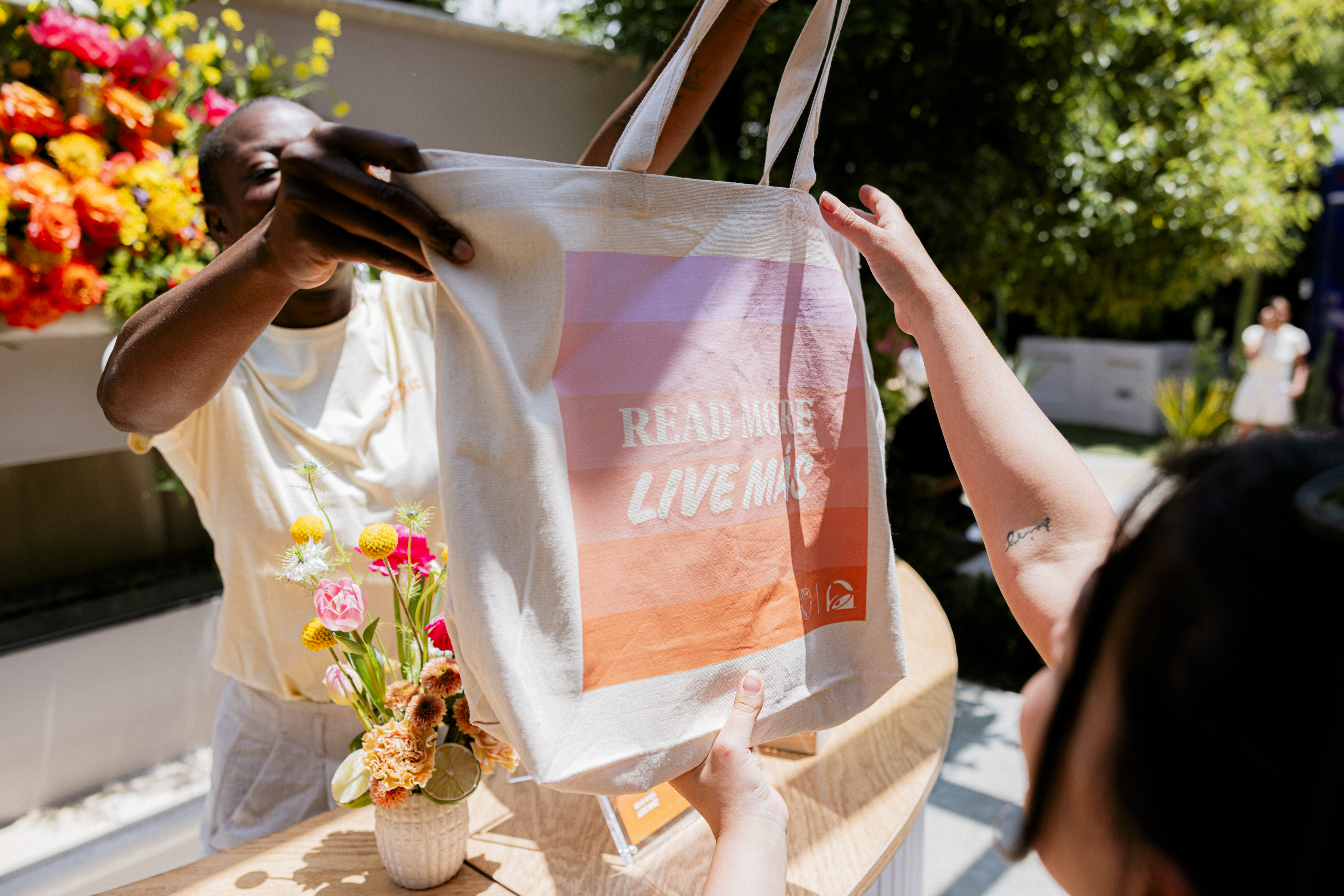 Image of gift bags from the Taco Bell x Reese’s Book Club May 2024 event