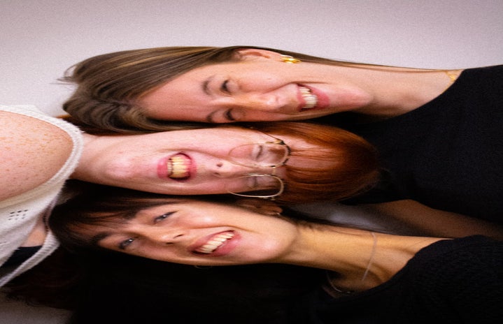 Three woman smiling