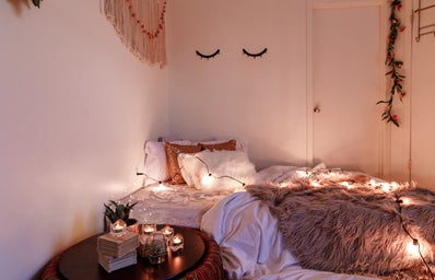 decorated room with cozy bed