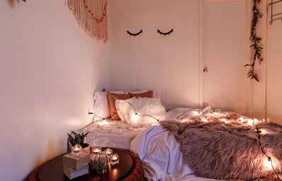 decorated room with cozy bed