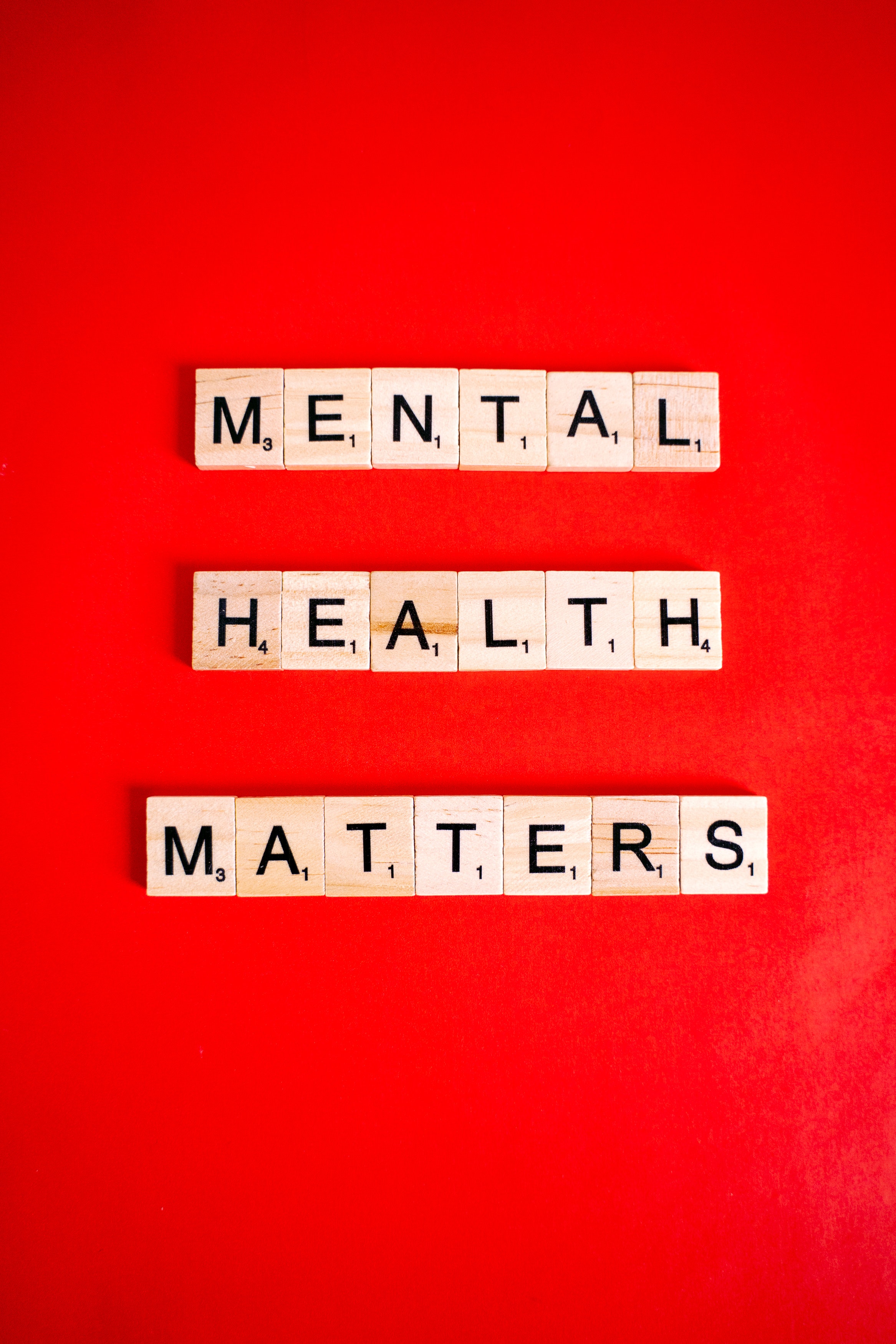 block letters spelling out \"mental health matters\" on a red background