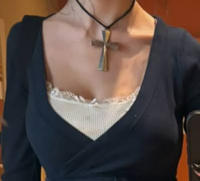 Large silver cross necklace.