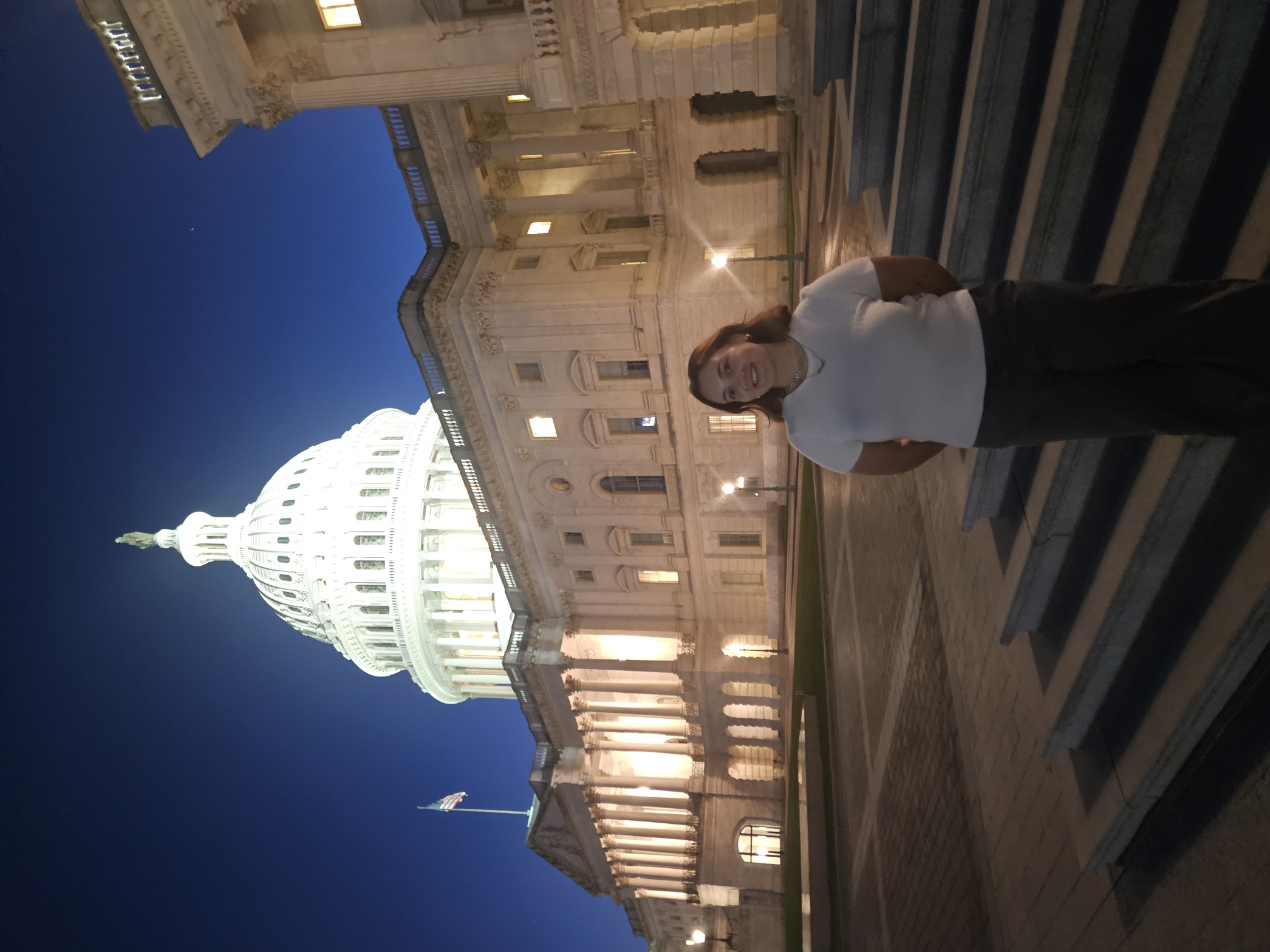 woman standing in front of the capitol