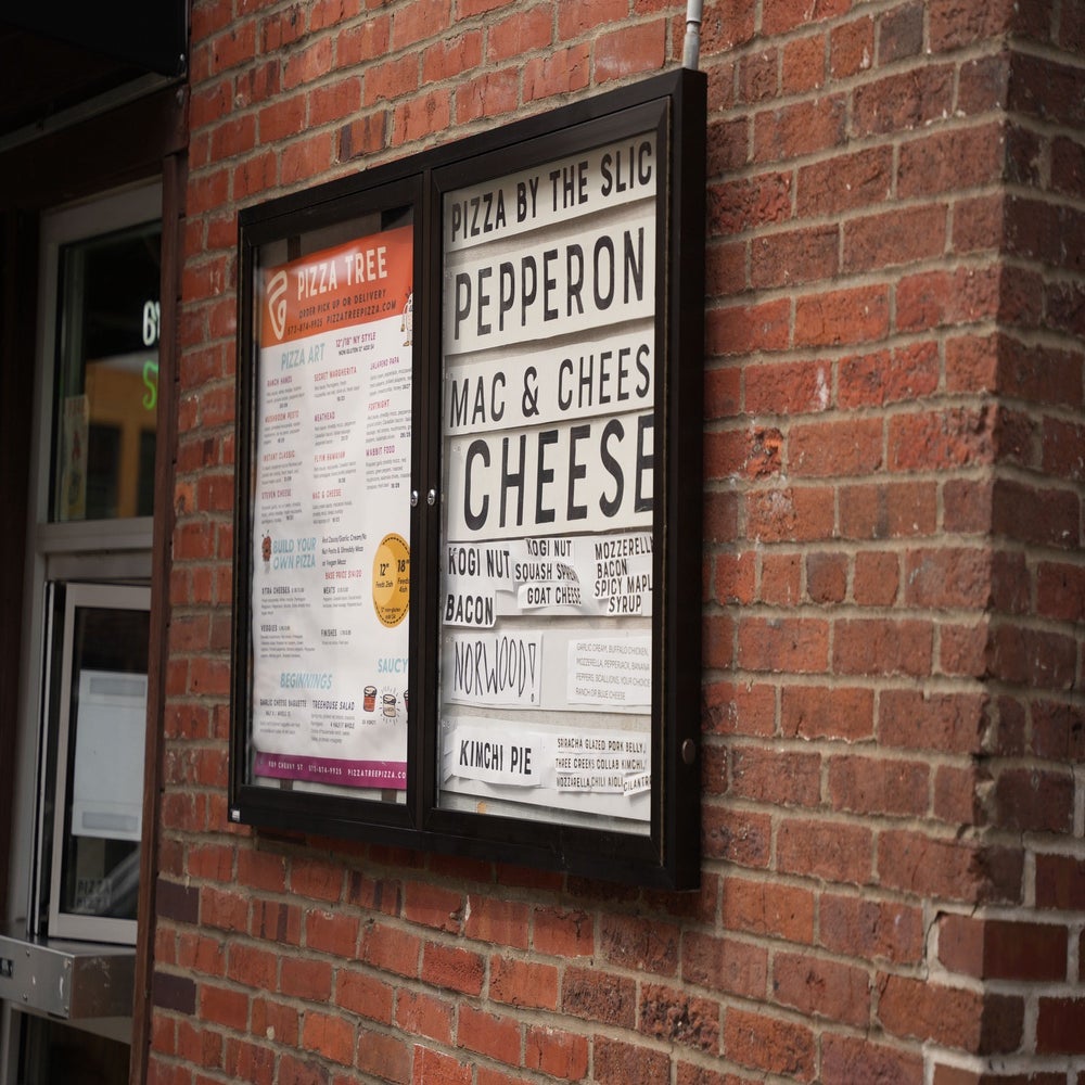 Image of a menu at Pizza Tree, a local pizza shop in Columbia, Missouri