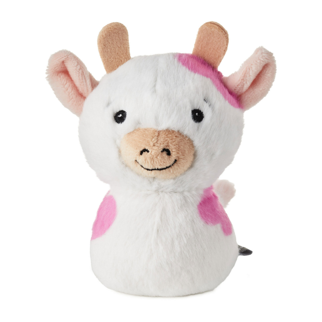 pink and white cow plush toy