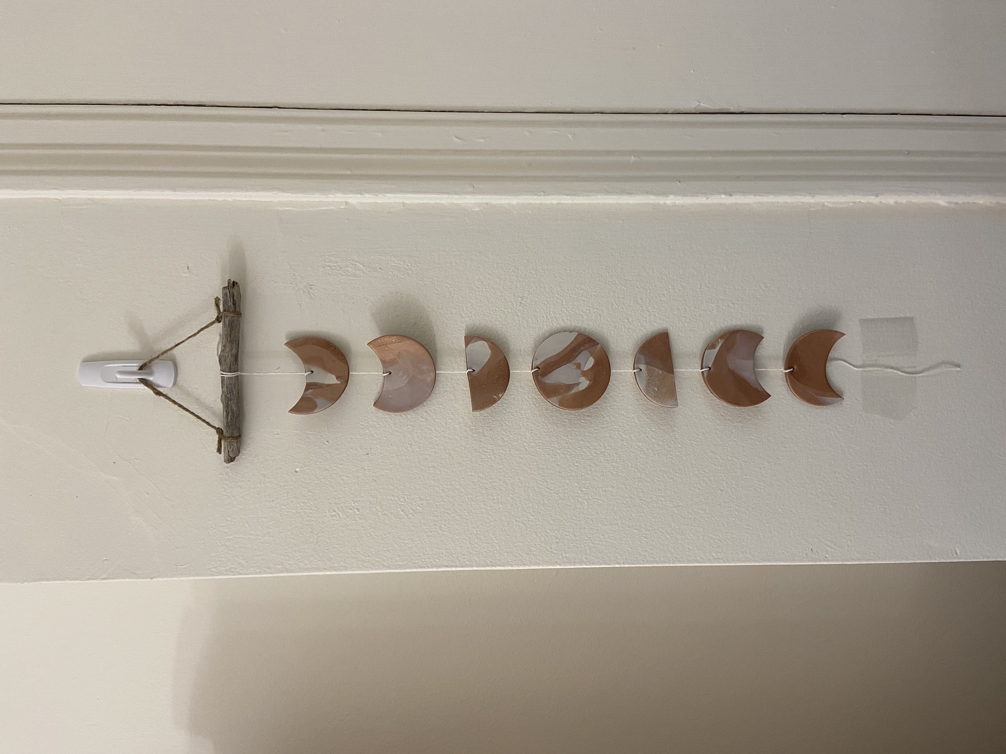 Moon phase wall hanging in college dorm by Samantha Barth?width=698&height=466&fit=crop&auto=webp&dpr=4