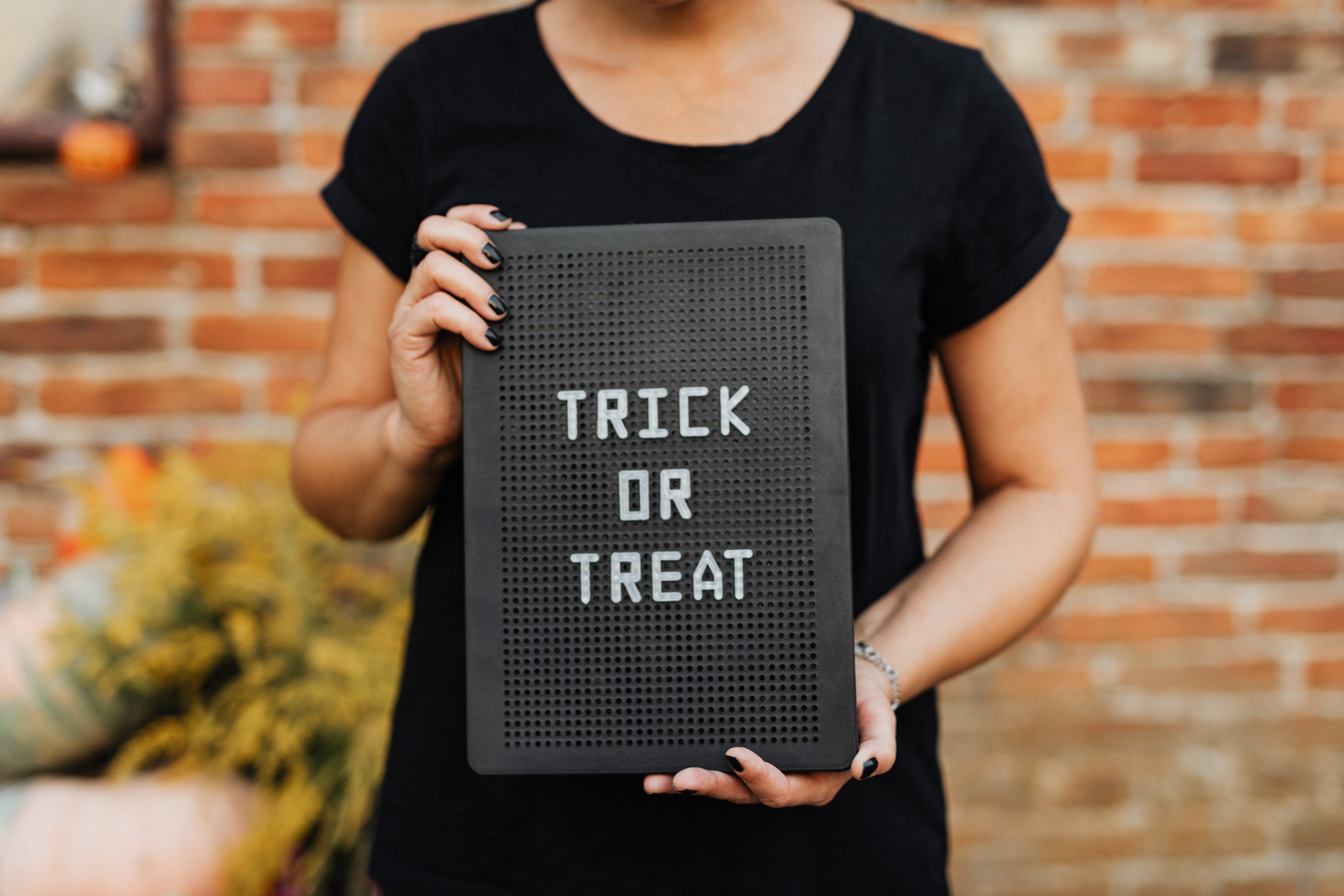 trick or treat sign by Karolina Grabowska?width=698&height=466&fit=crop&auto=webp&dpr=4