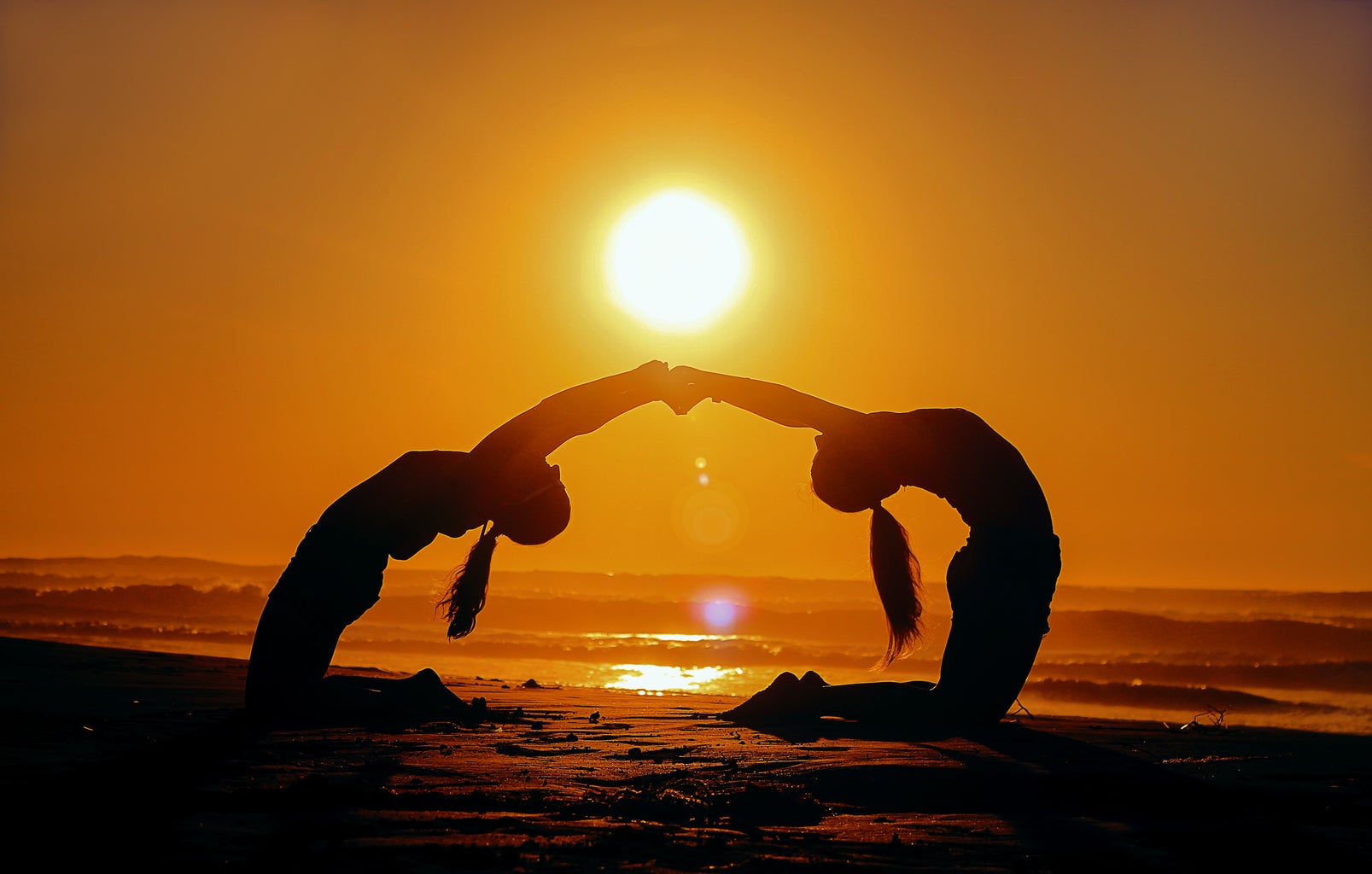 Yoga in a sunset
