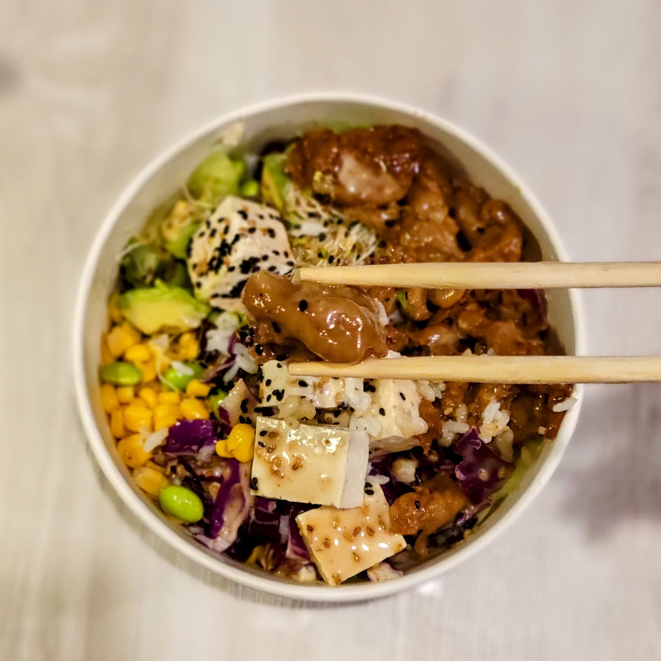 Chopsticks holding food