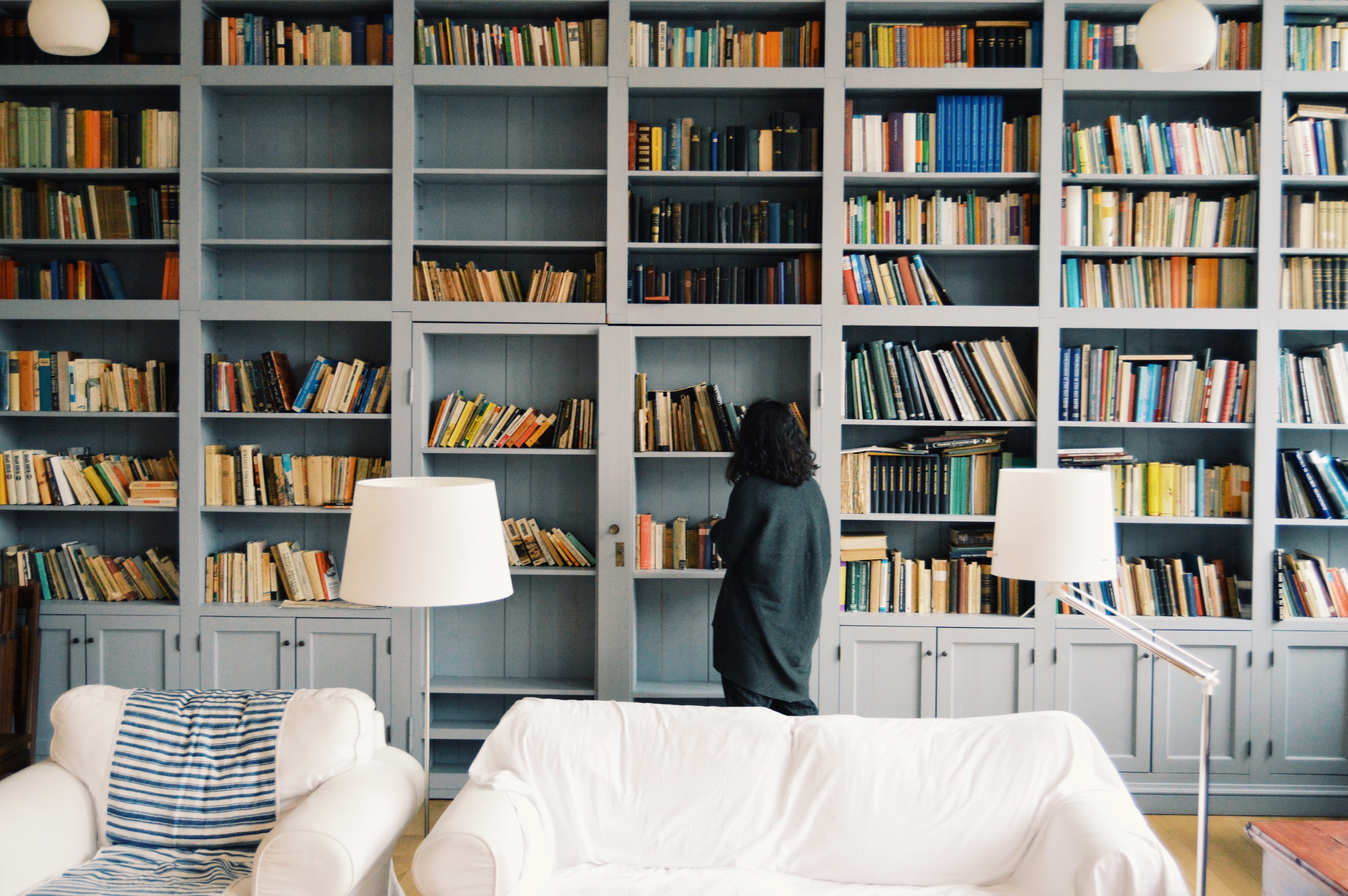 bookshelf by Radu Marcusu on Unsplash