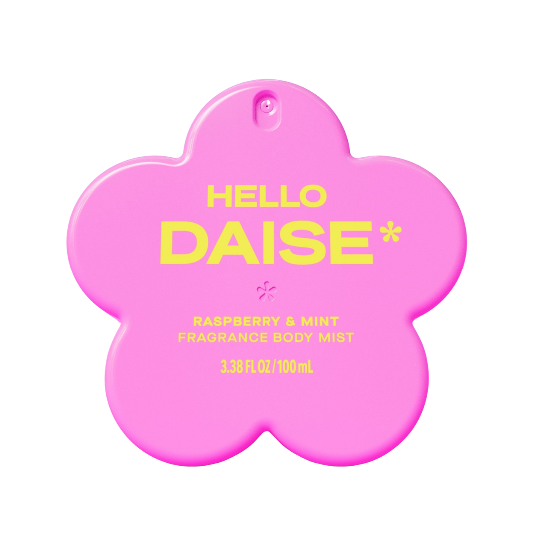 Pink flower-shaped bottle of body mist with yellow text reading \