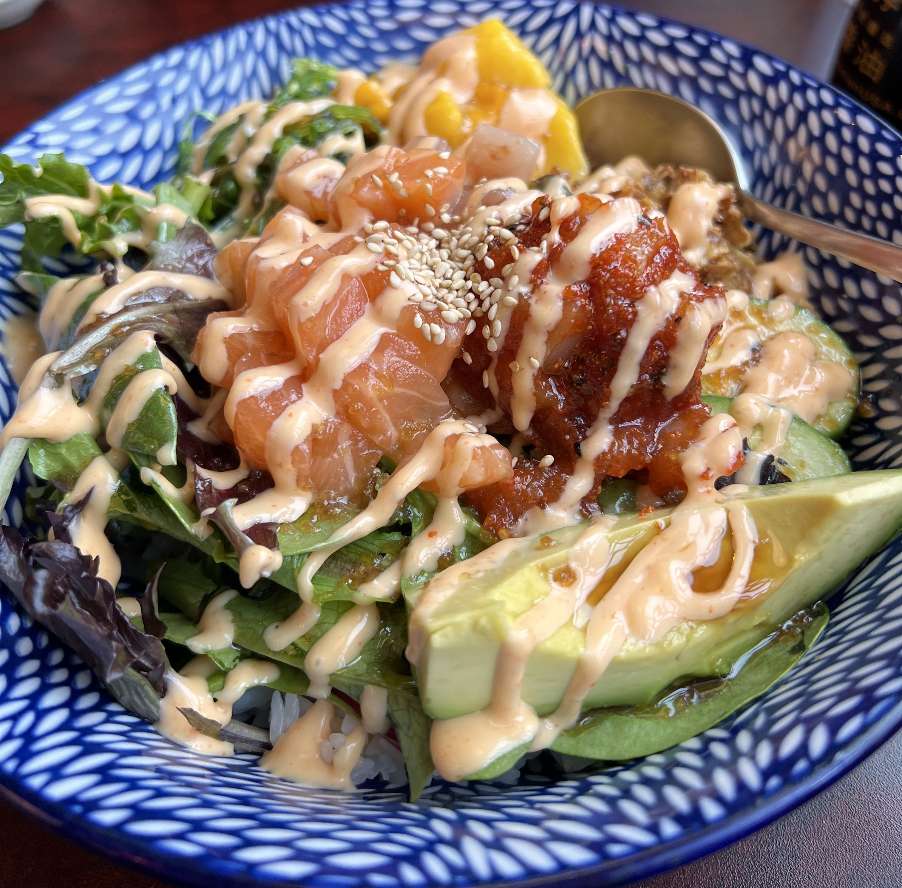 poke in blue bowl close up