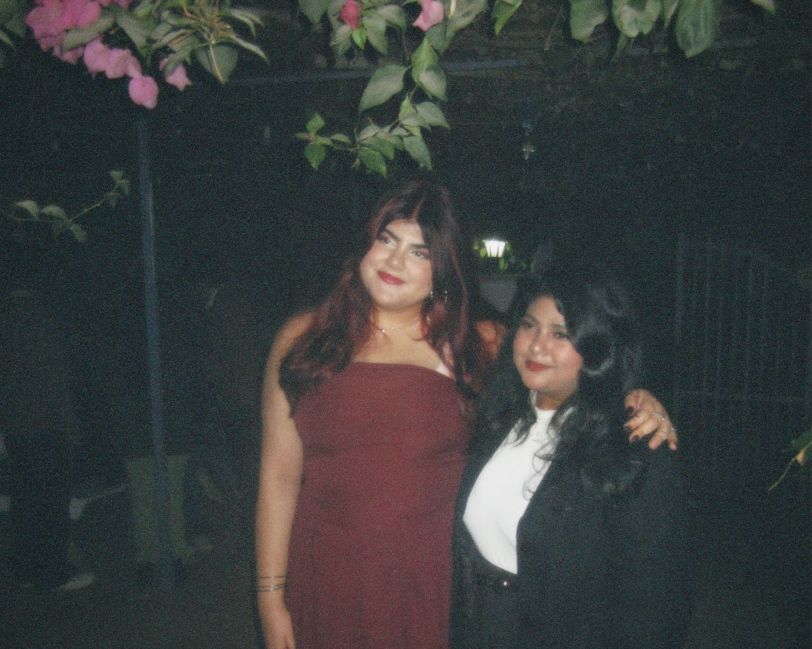 Two best friends smiling for a picture.