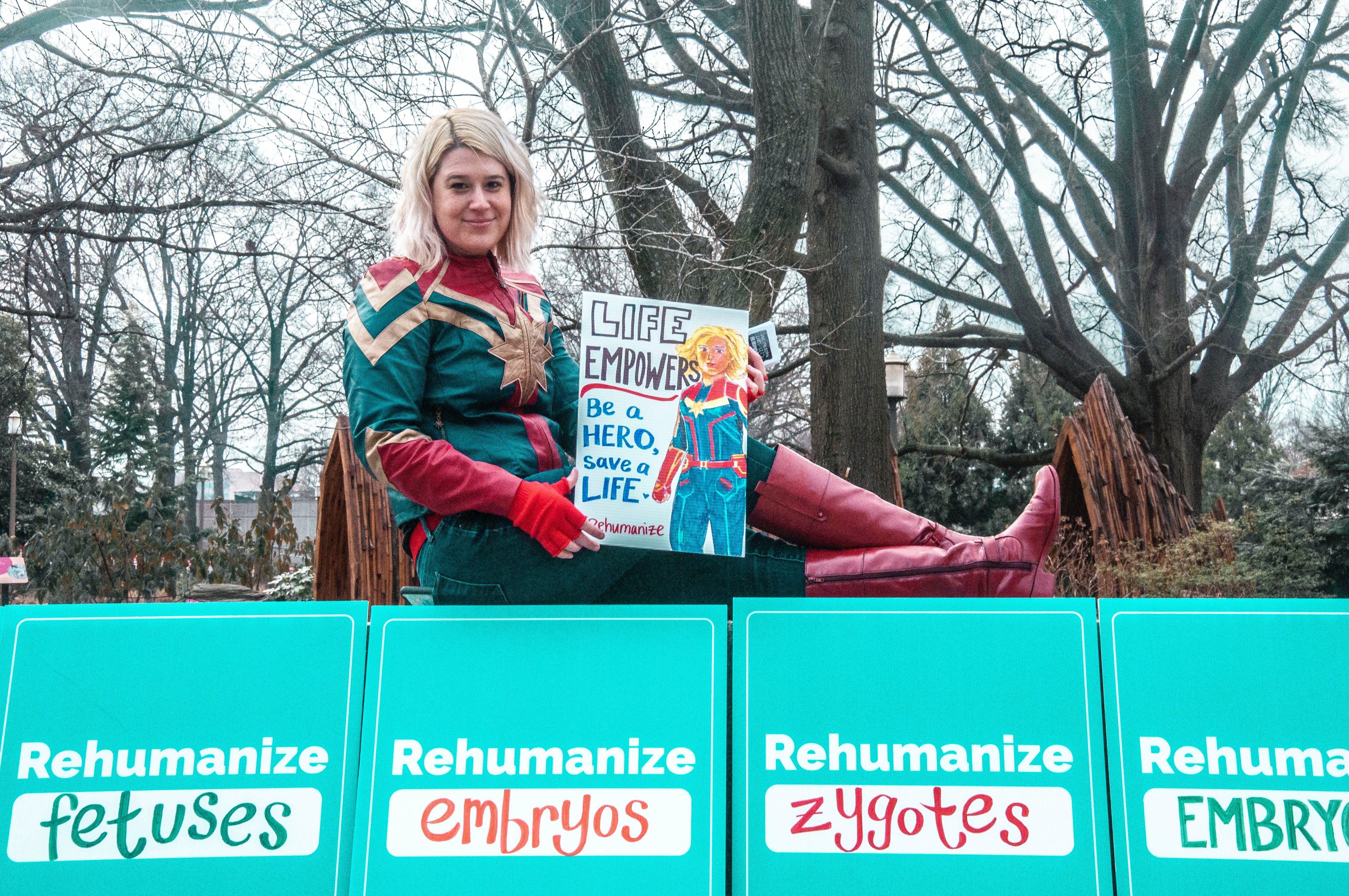 Captain Marvel at Protest by Maria Oswalt