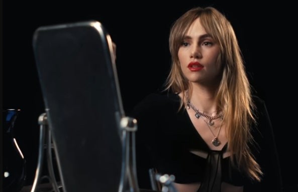 Suki Waterhouse in the music video of the song\"To Love\"