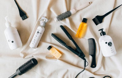 overlay of hair care products on light background