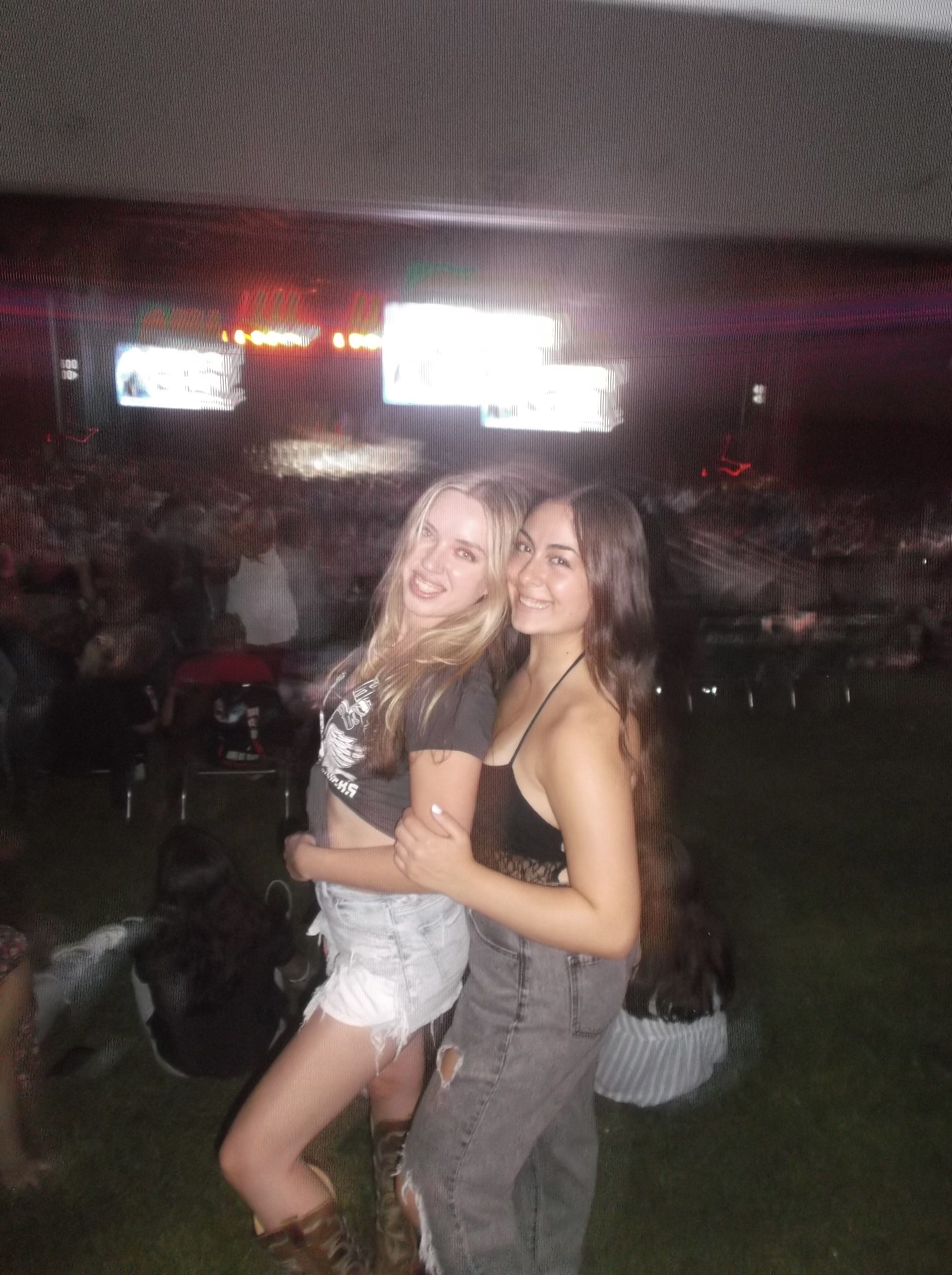 Best friends at a Pitbull concert