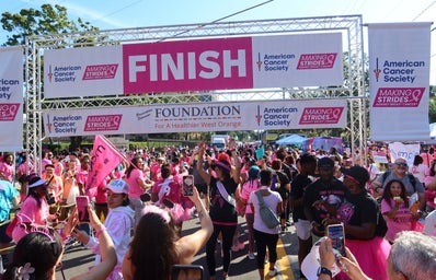 My aunt passes the finish line at the breast cancer walk