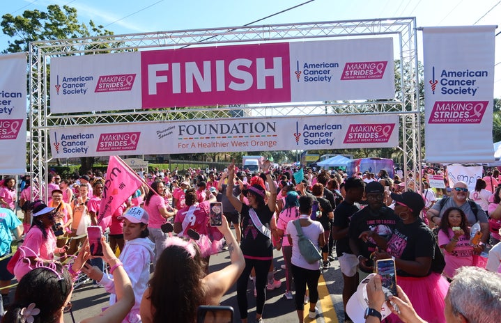 My aunt passes the finish line at the breast cancer walk