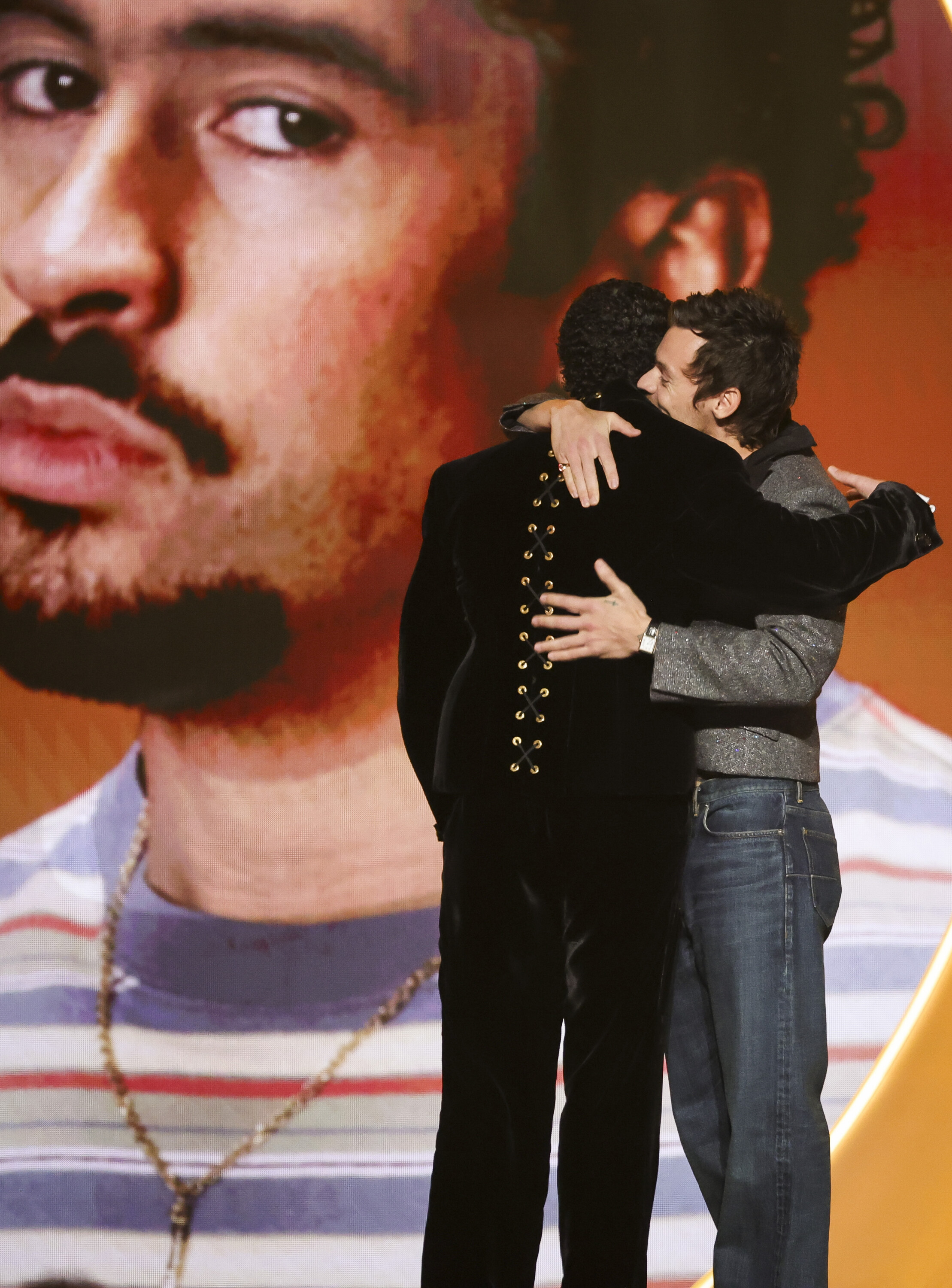 bad bunny hugs harry styles at the 2026 grammys