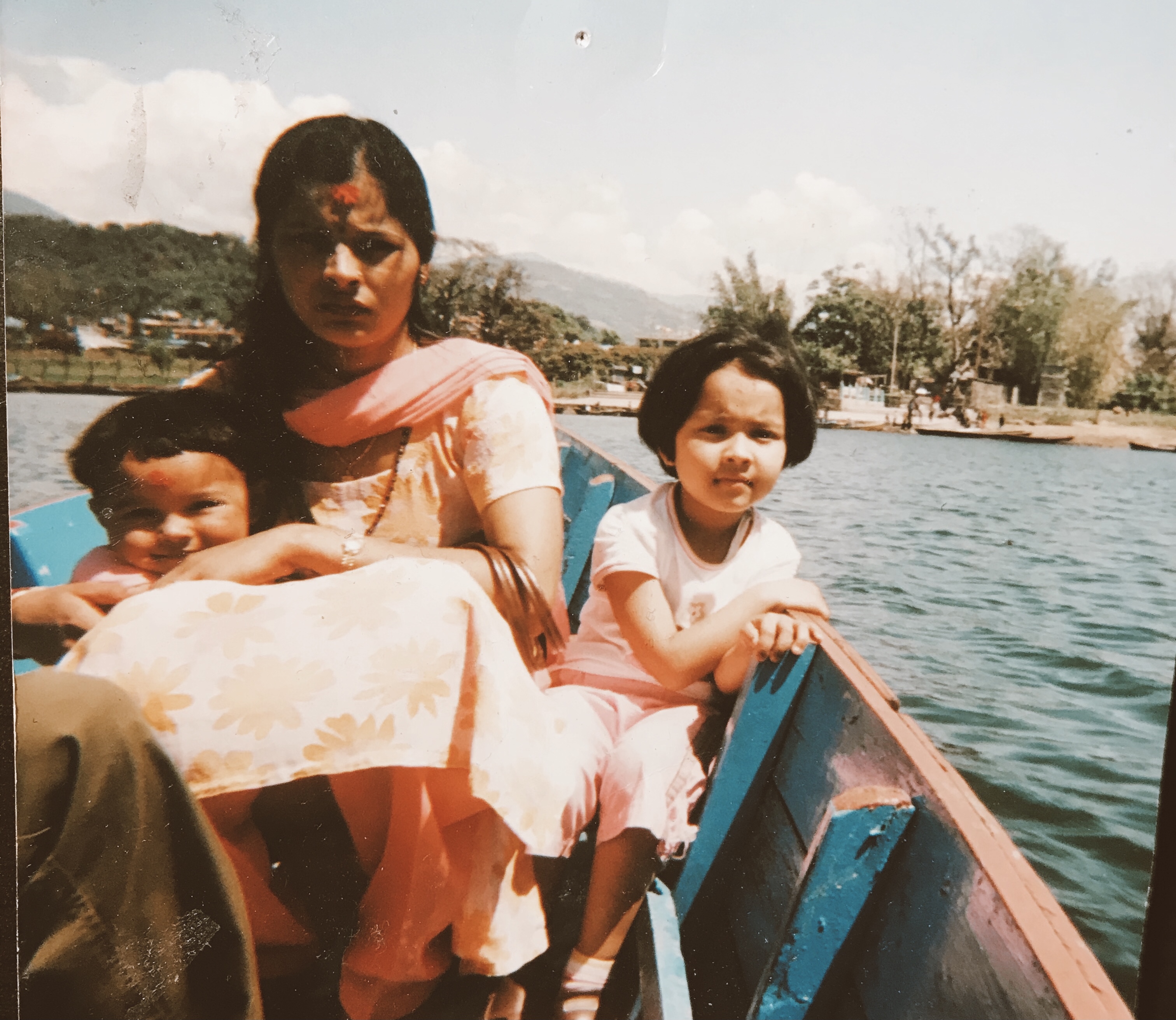 A picture of my mother, my sister, and me during a family vacation. Location: Pokhara, Nepal