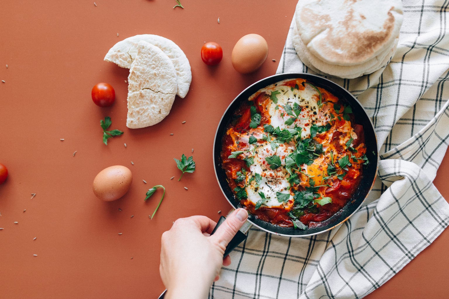 Shakshuka, a Middle Eastern dish with fried eggs, tomatoes, onions, red pepper and spices