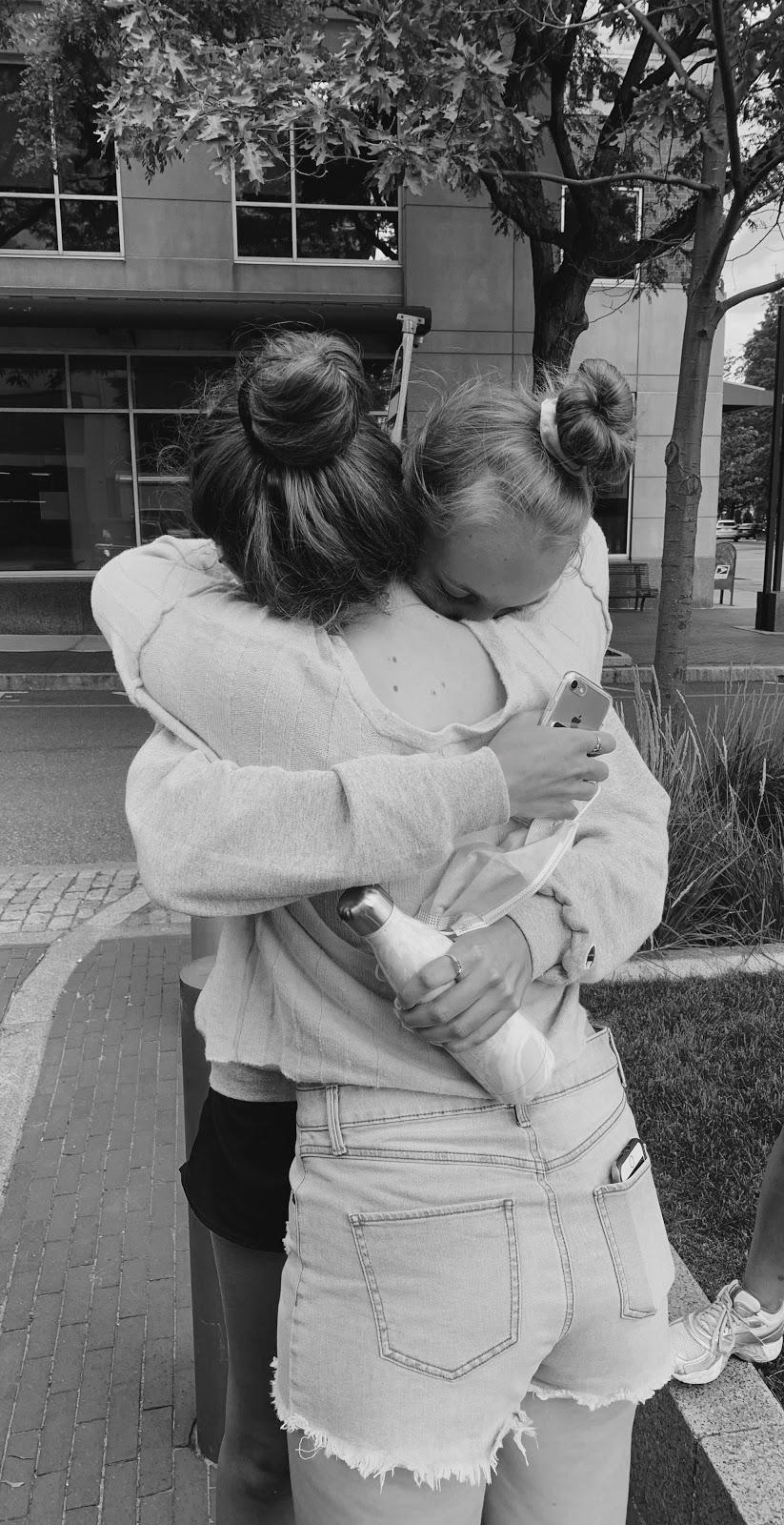 Nicolina hugs friend