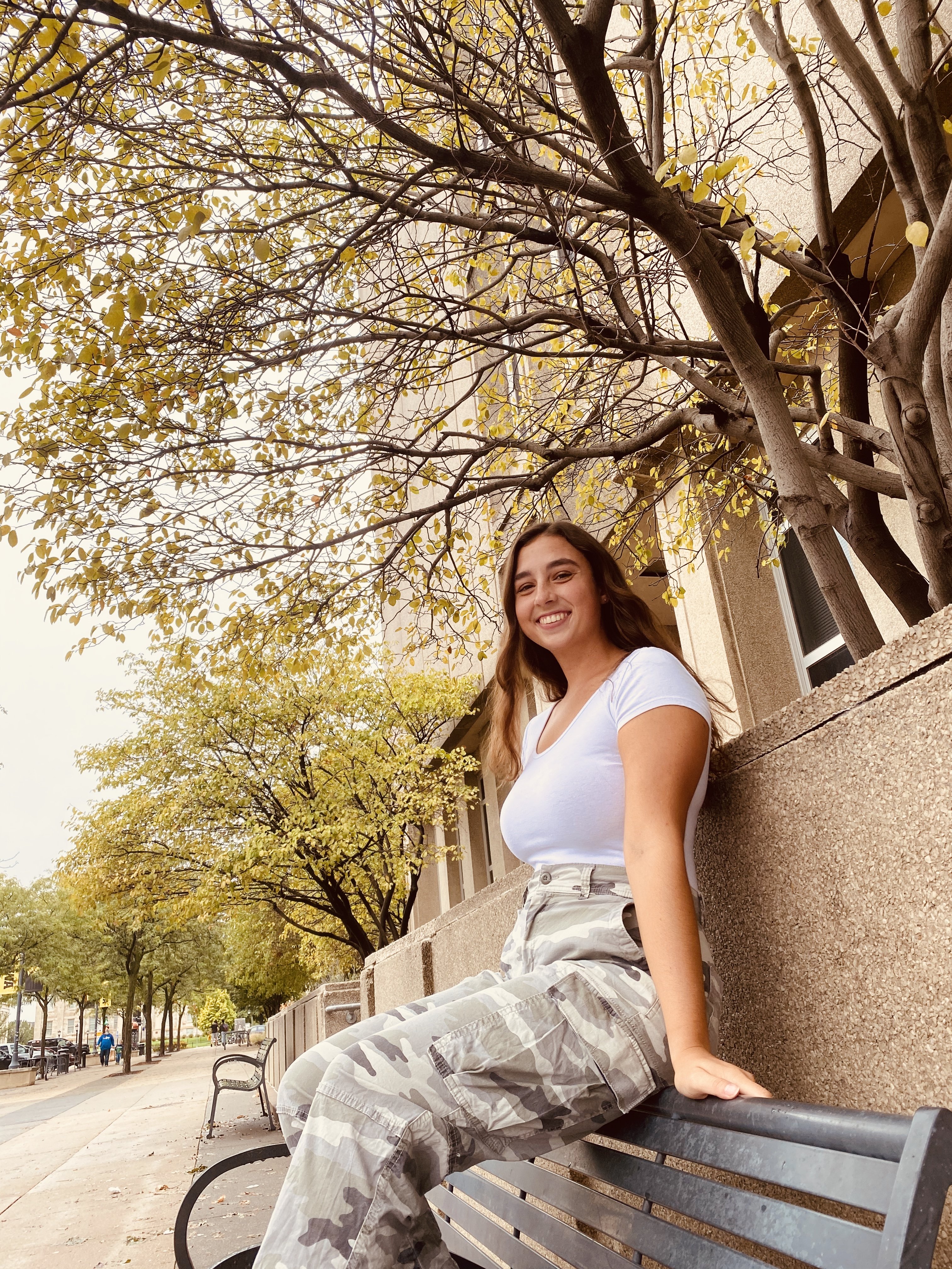 girl sitting on a bench