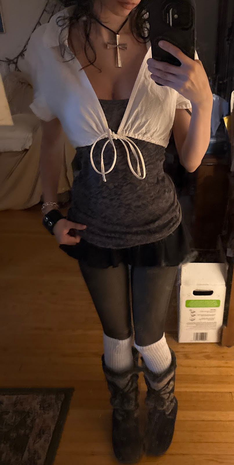 Mirror selfie of outfit.