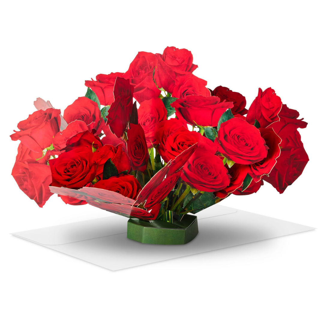 red paper roses on green base