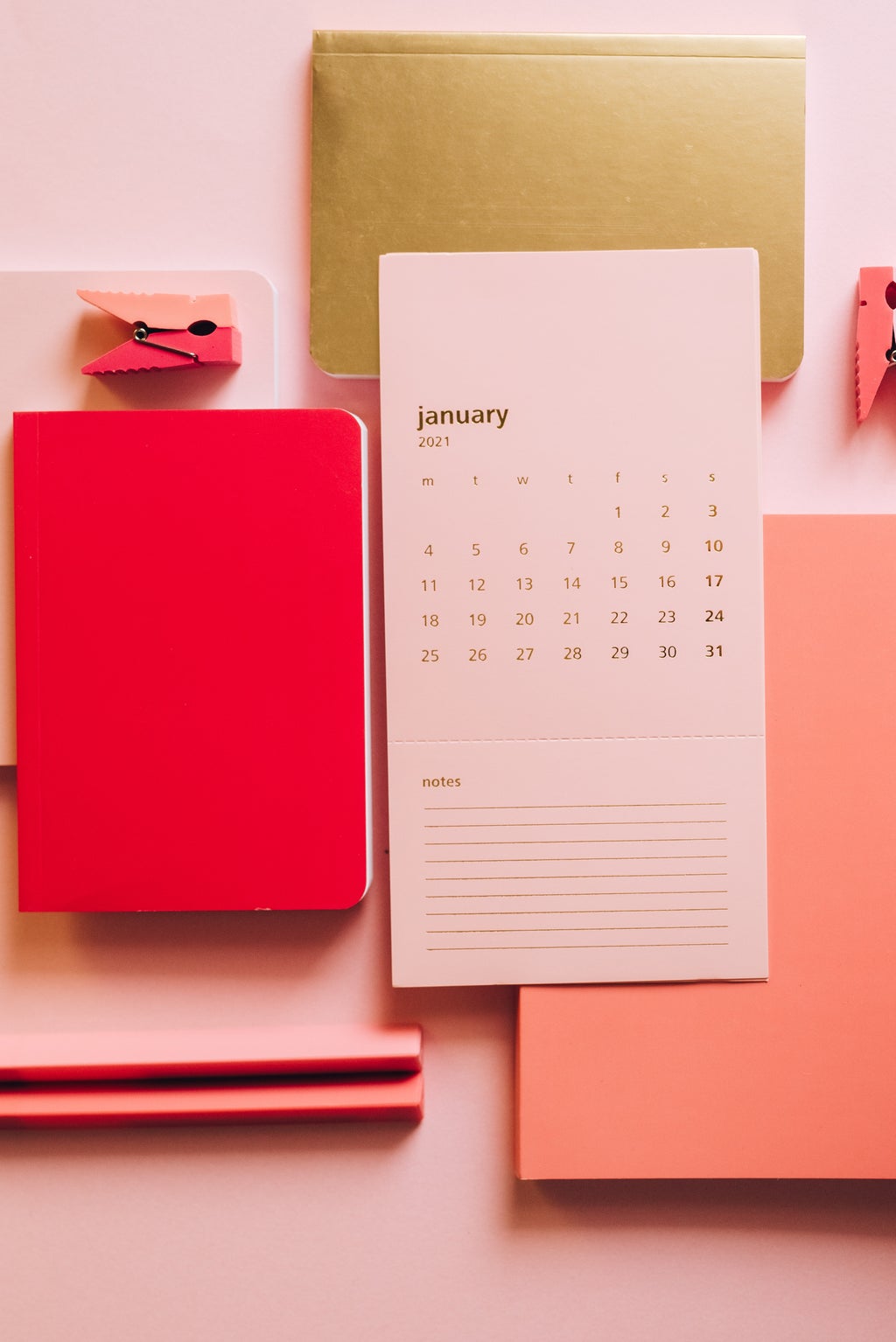 January calendar and pink stationary