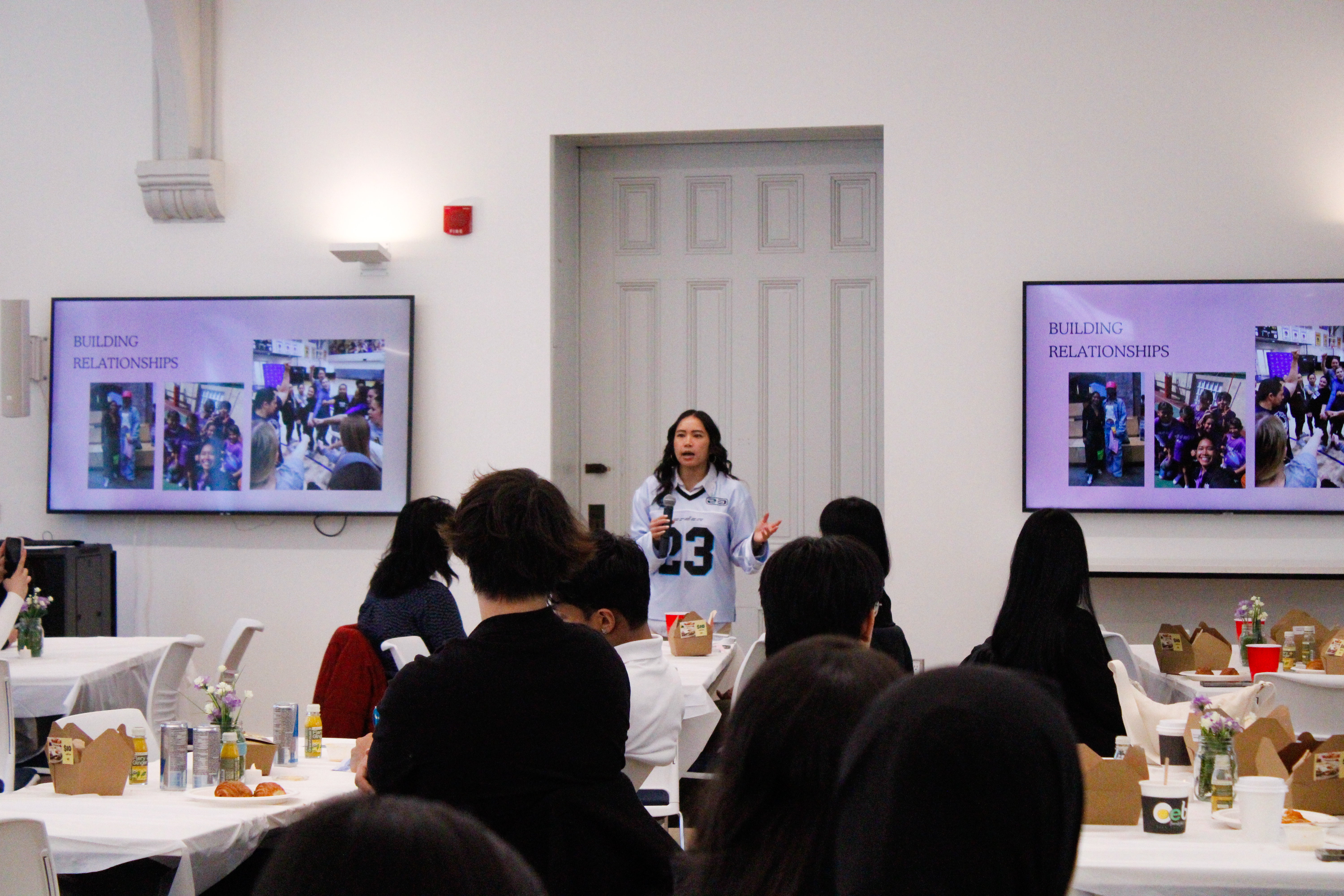 Founder of The Give and Grow Olivia Ho gives a presentation on how to grow your business at the BOOSTHer She Speaks Conference.