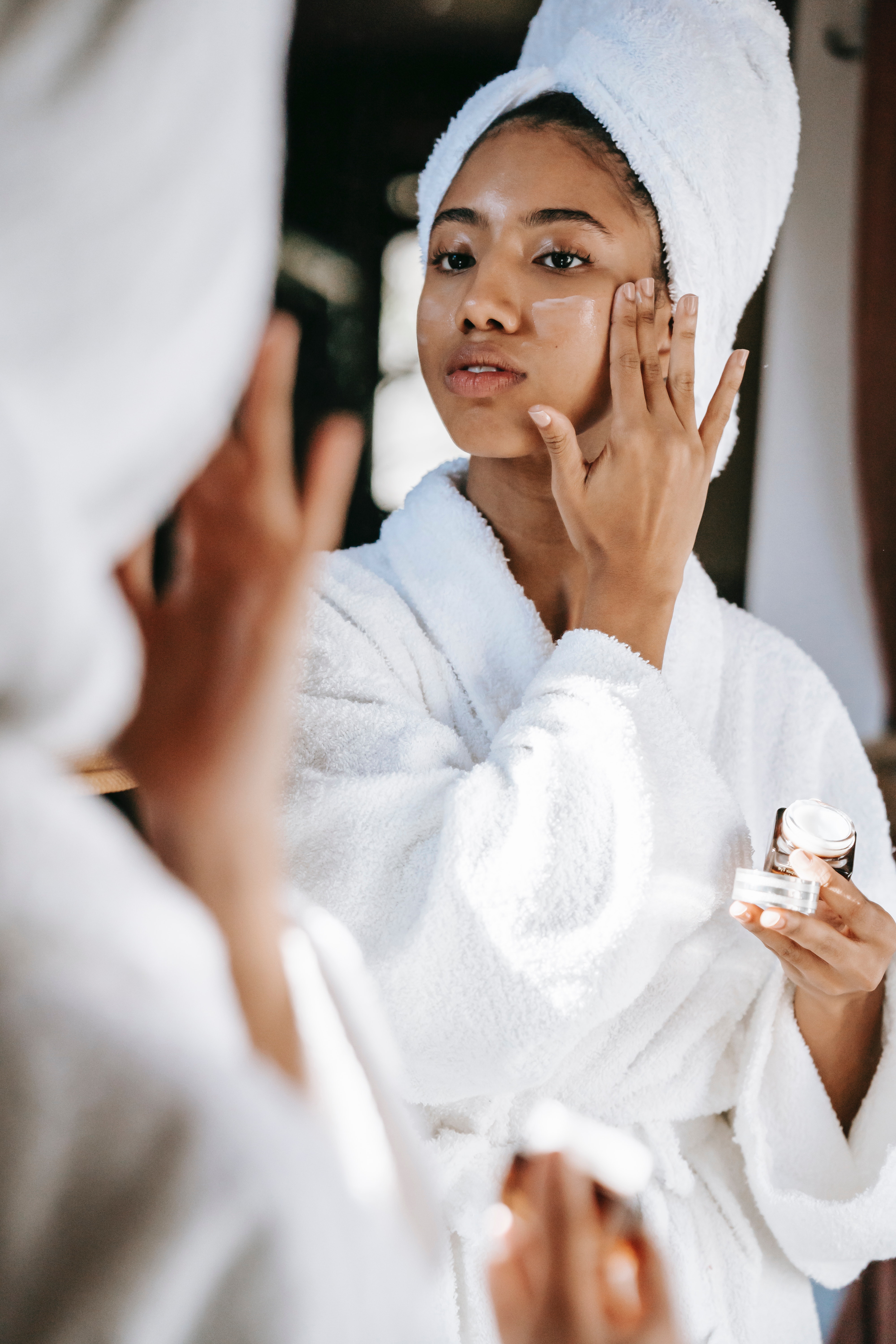 woman applying skin care