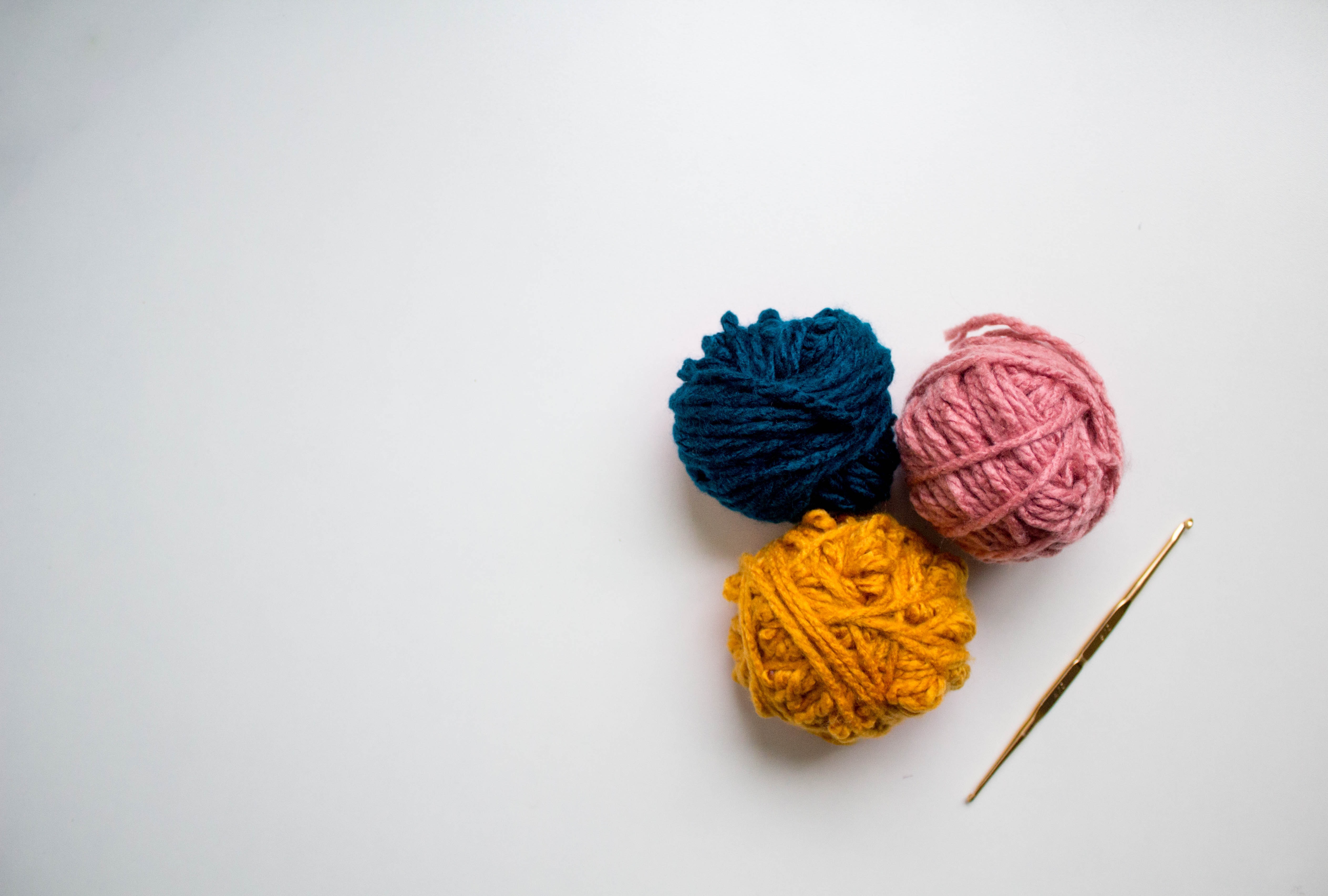 three balls of yarn by Unsplash?width=698&height=466&fit=crop&auto=webp&dpr=4