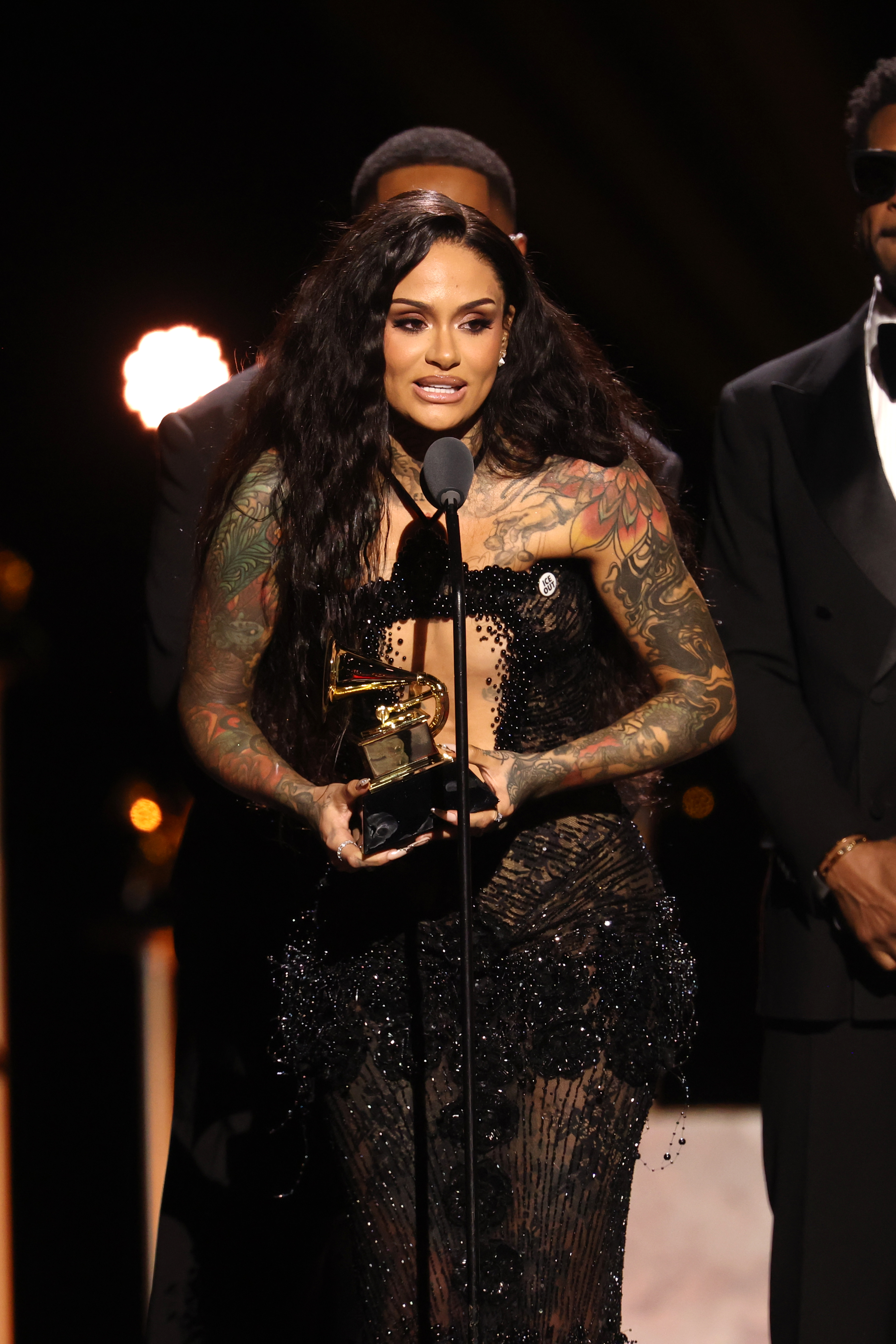 kehlani accepting an award at the 2026 grammys