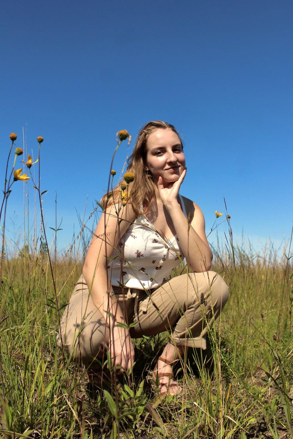 Girl in wildflower field