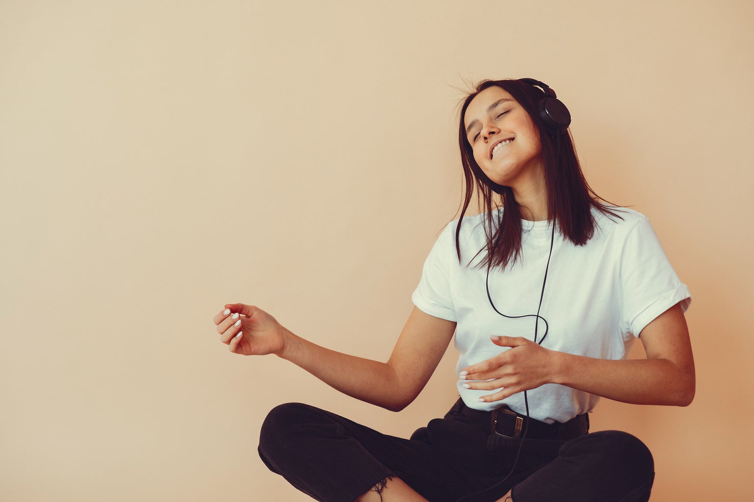 woman listening to music and dancing