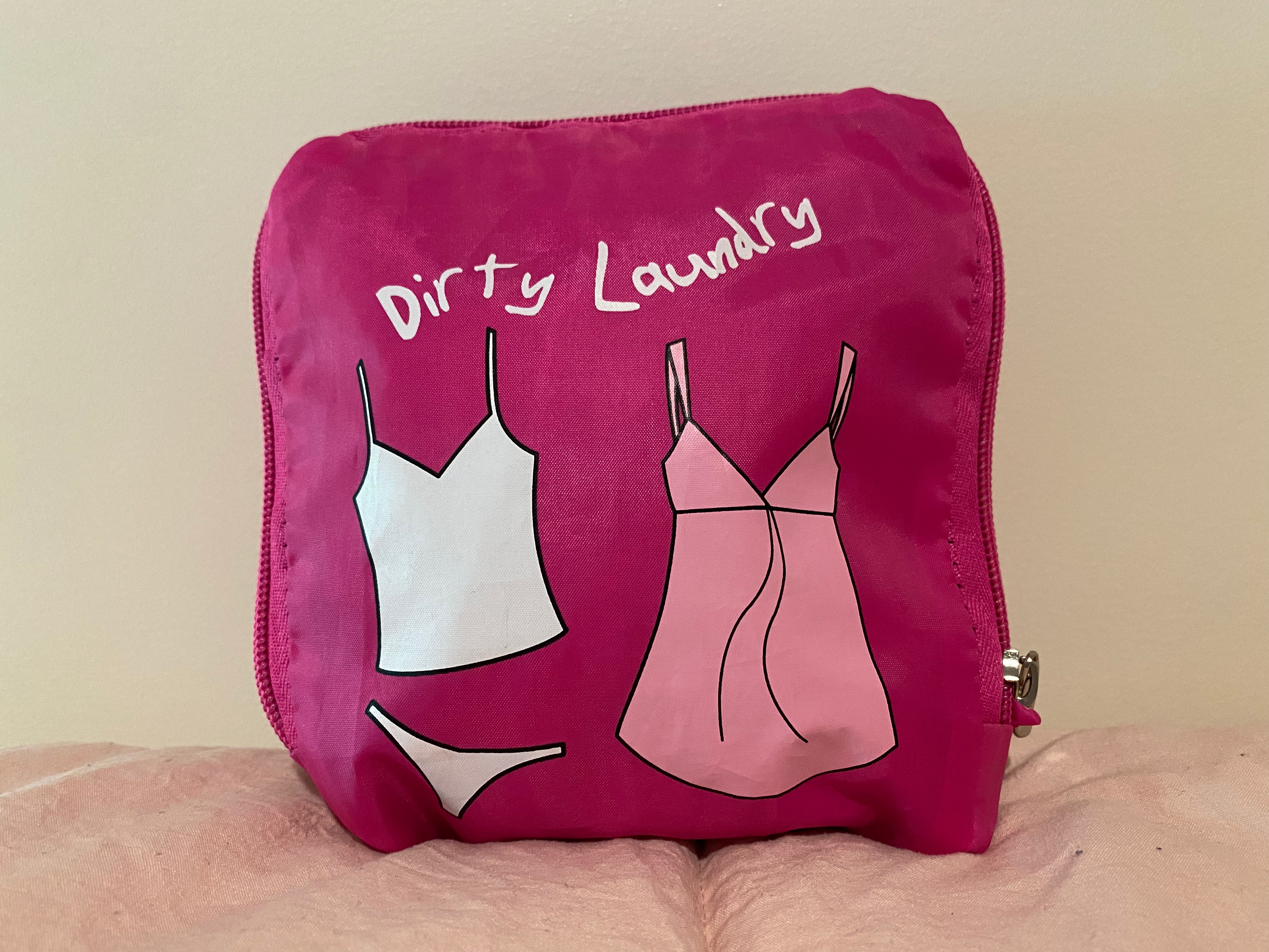 A travel laundry bag still folded