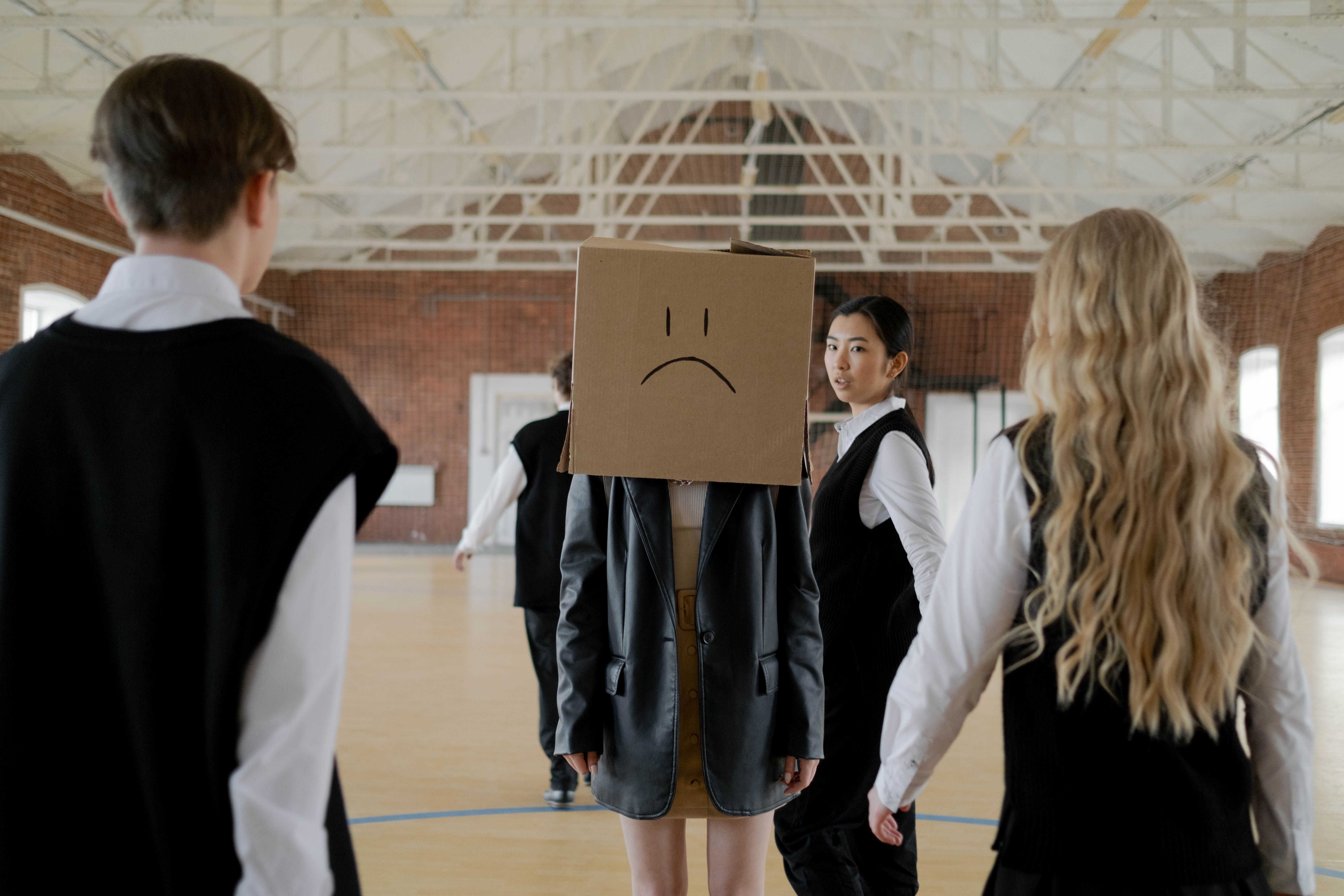 Girl with box on her head