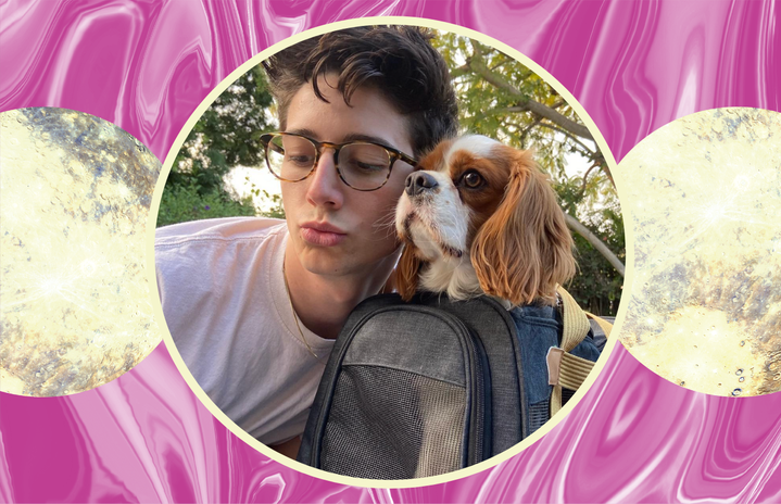 Milo Manheim posing with his dog, Lou.