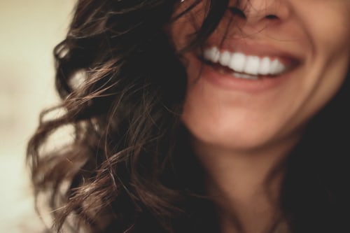 woman smilingjpg by Unsplash?width=698&height=466&fit=crop&auto=webp&dpr=4