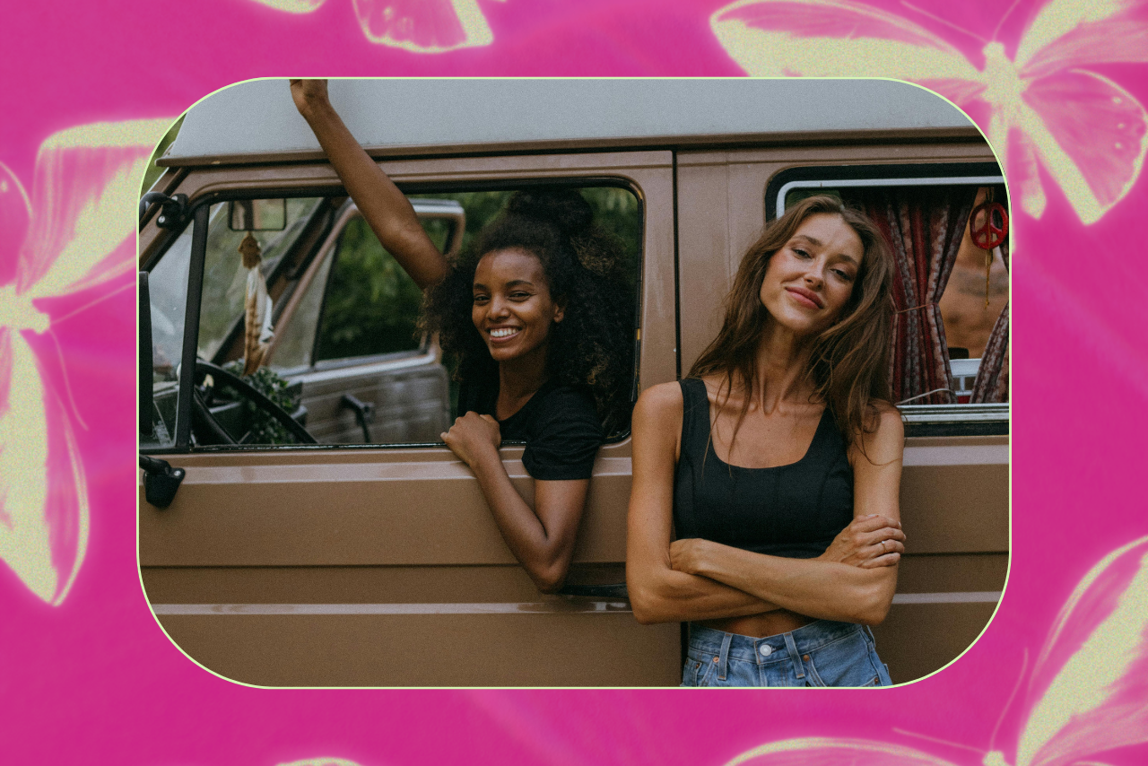 Two young women in a beach van